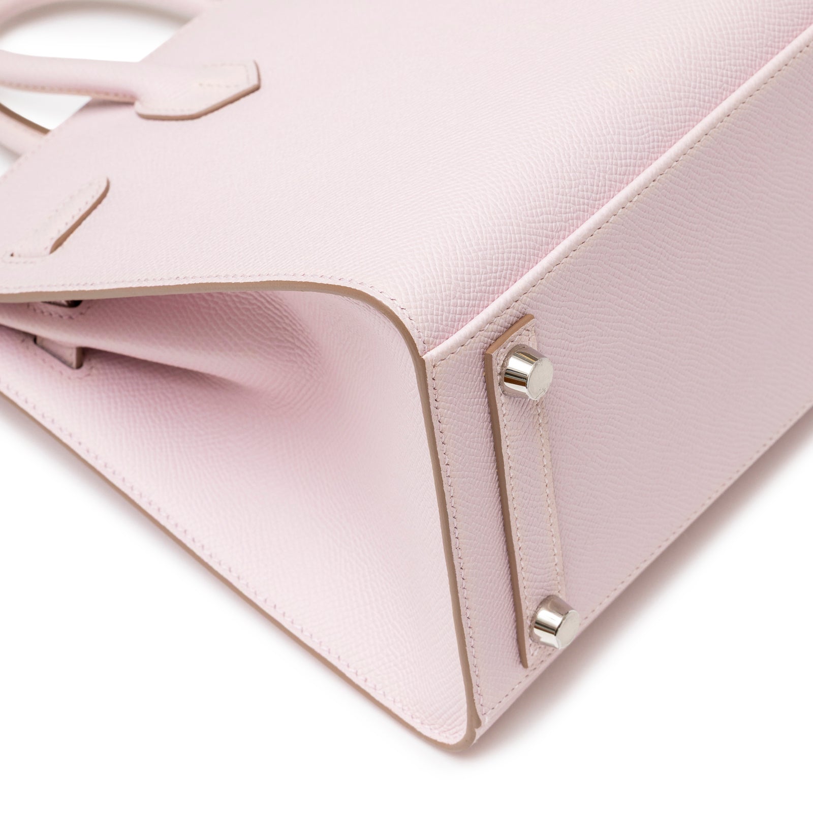 Close-up of bottom corner and silver hardware feet on Hermès Birkin Sellier 25 Mauve Pale Epsom Palladium Hardware handbag