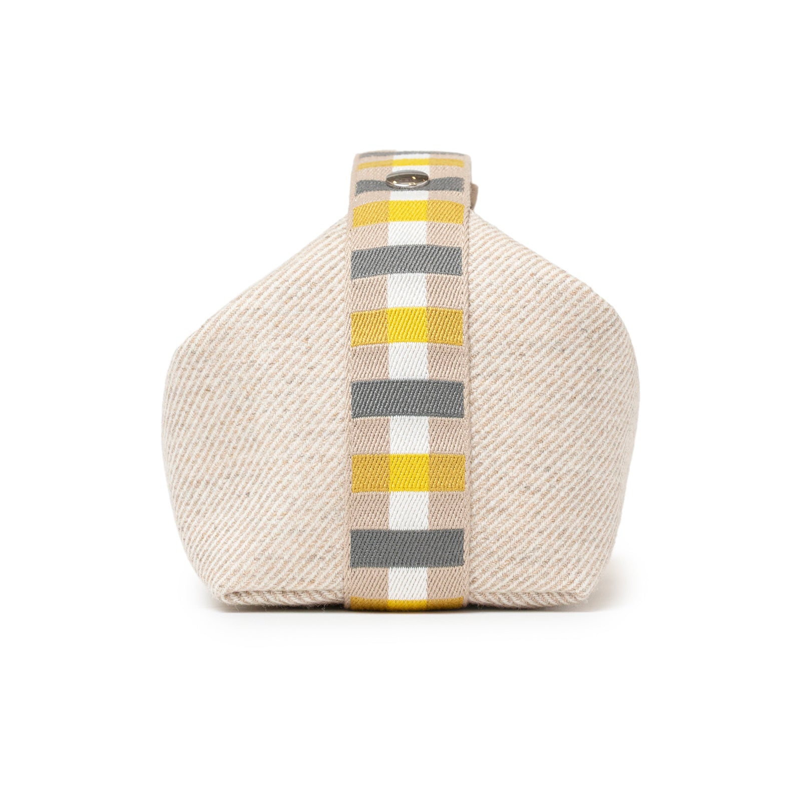 Side view of Hermès Bride-a-Brac au Carre Case Small Model Seigle in woven beige fabric with multicolor strap detail