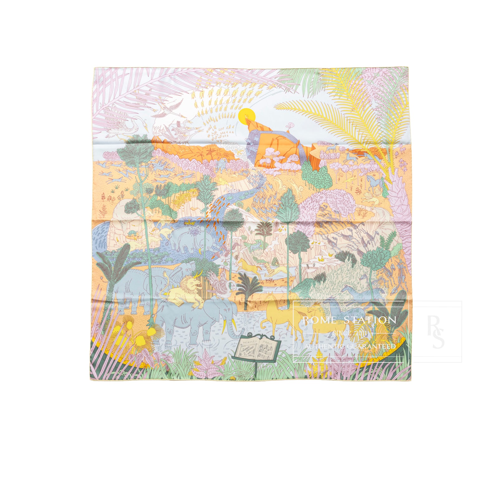 Top-down view of Hermès Carre 90 Le Carnaval des Animaux Silk Scarf Blue Glacier Jaune Vif Gris with detailed animal and foliage print