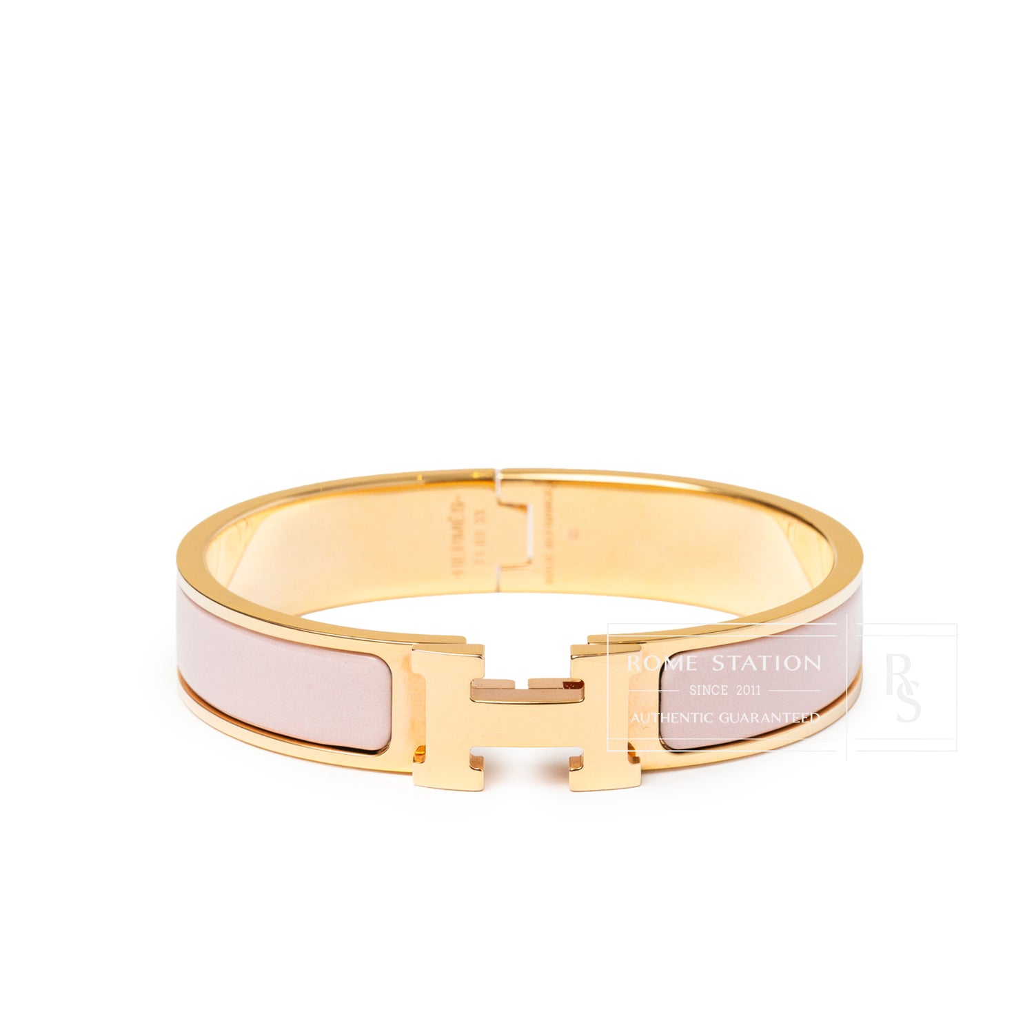 Front view of Hermès Clic H bracelet PM Pink Gold Hardware showing pale pink enamel and iconic H clasp