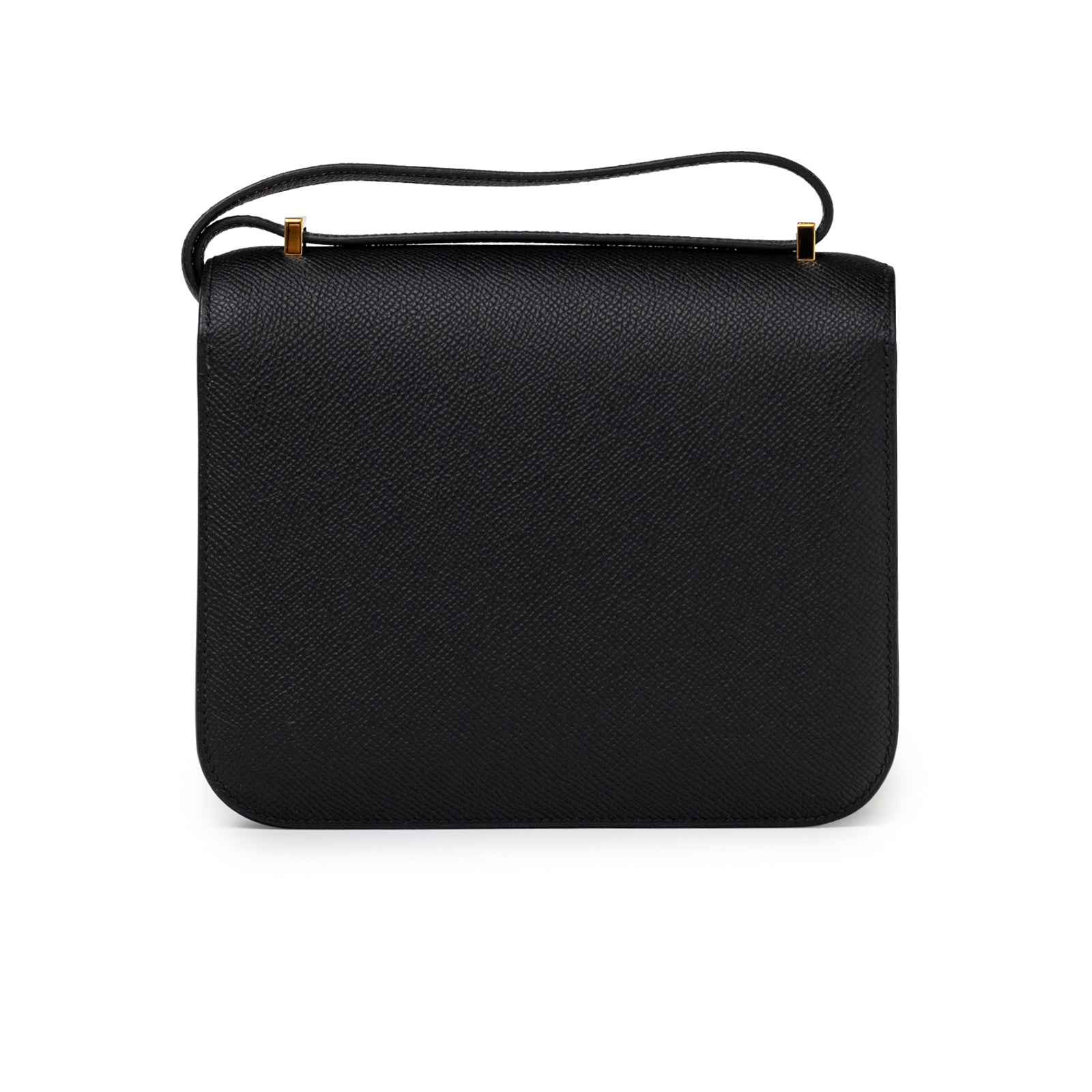 Back view of Hermès Constance 18 Black Epsom Gold Hardware showing textured leather and slim strap design