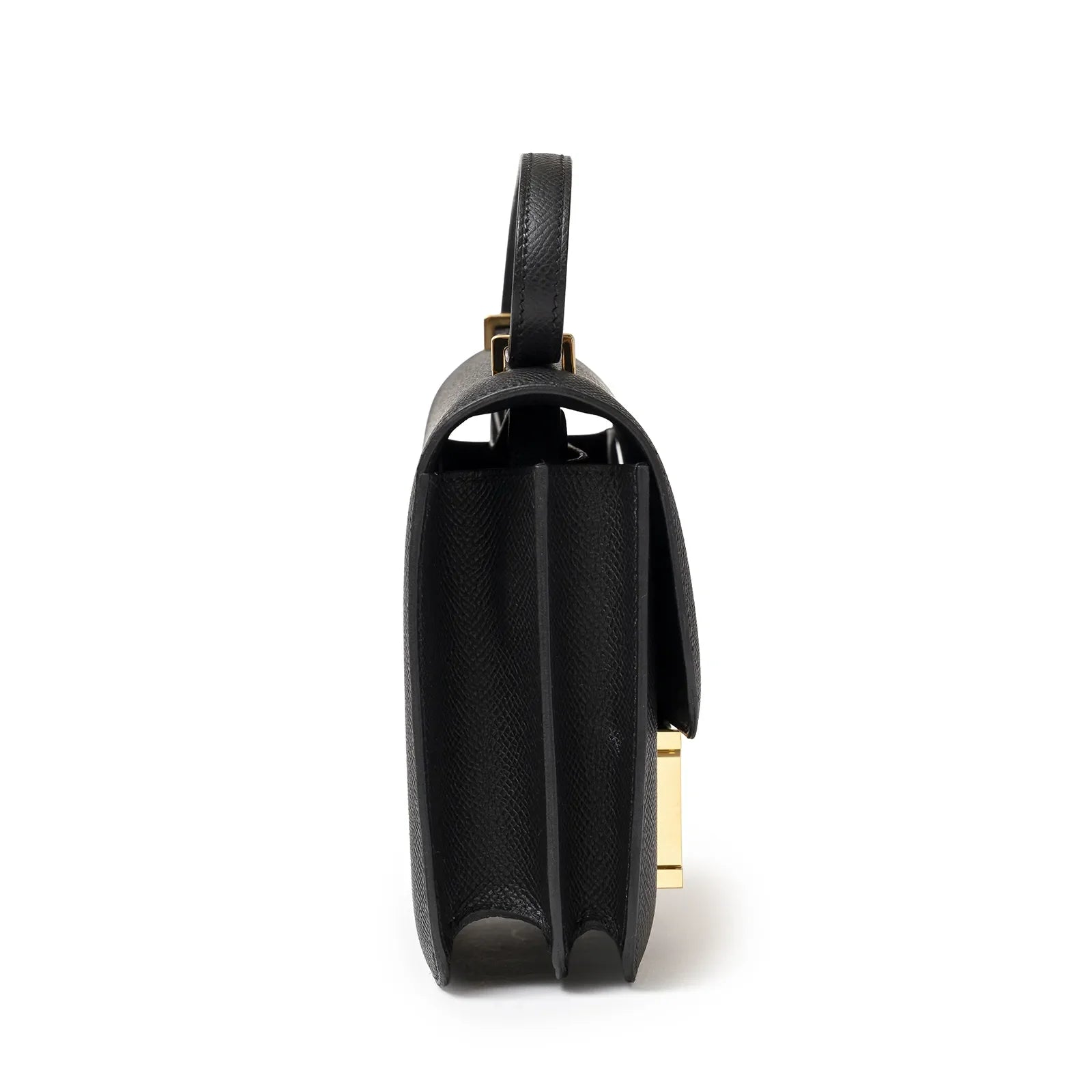 Side profile of Hermès Mini Constance 18 Black Epsom Gold Hardware showing handbag depth and structured design