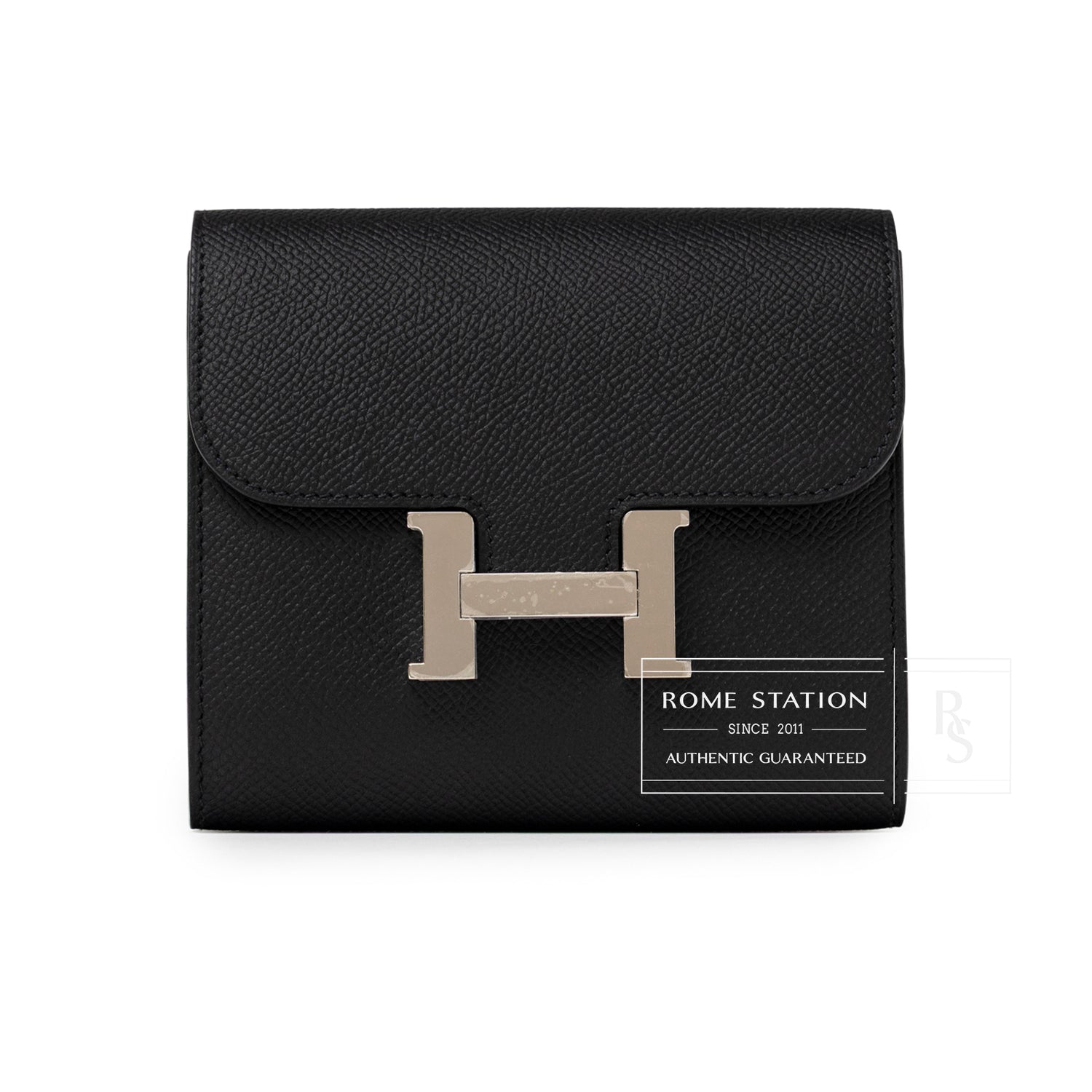 Front view of Hermès Constance Compact Wallet Black Epsom Palladium Hardware with textured leather and palladium clasp