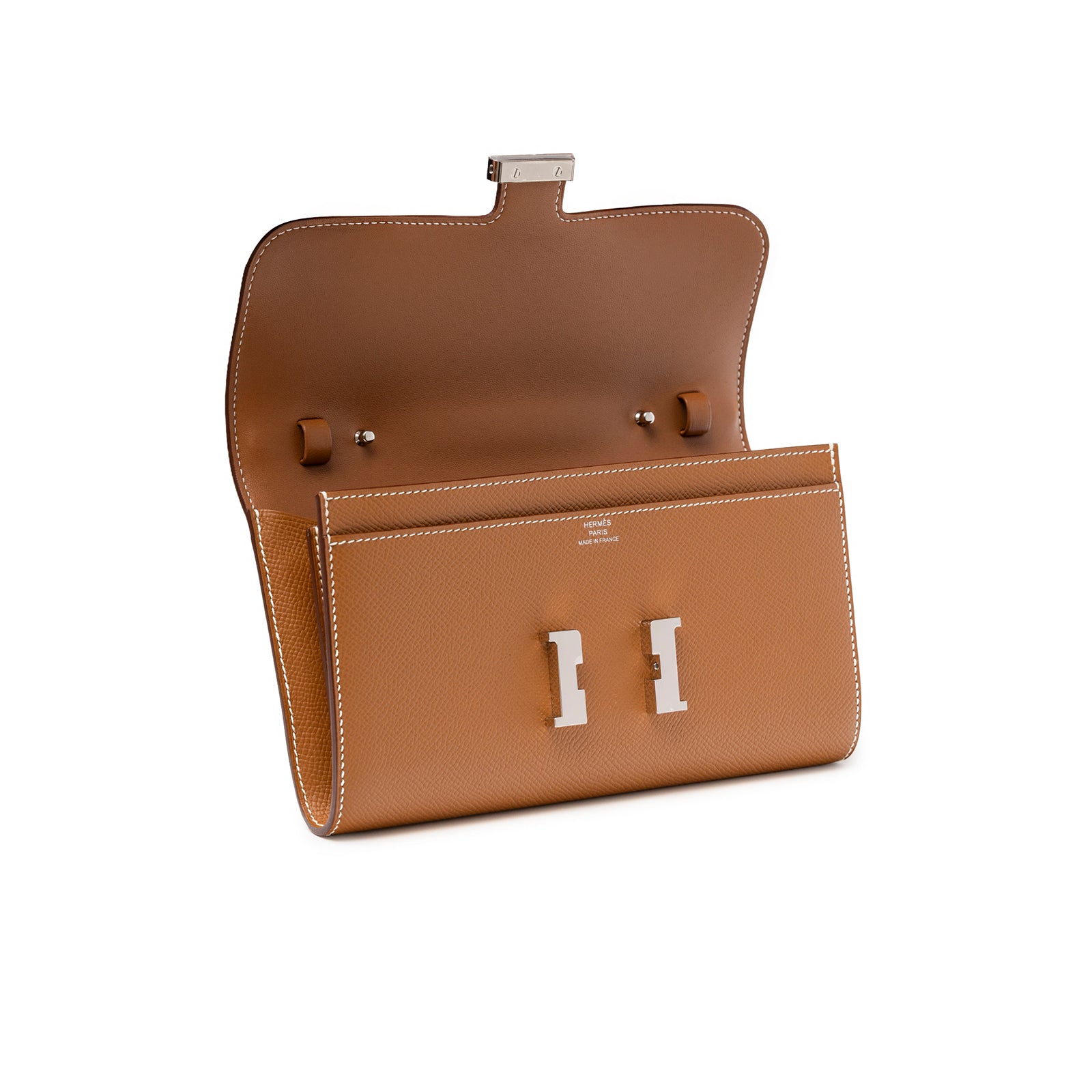 Open view of Hermès Constance To Go Wallet Gold Epsom Palladium Hardware showing interior smooth leather and clasp design