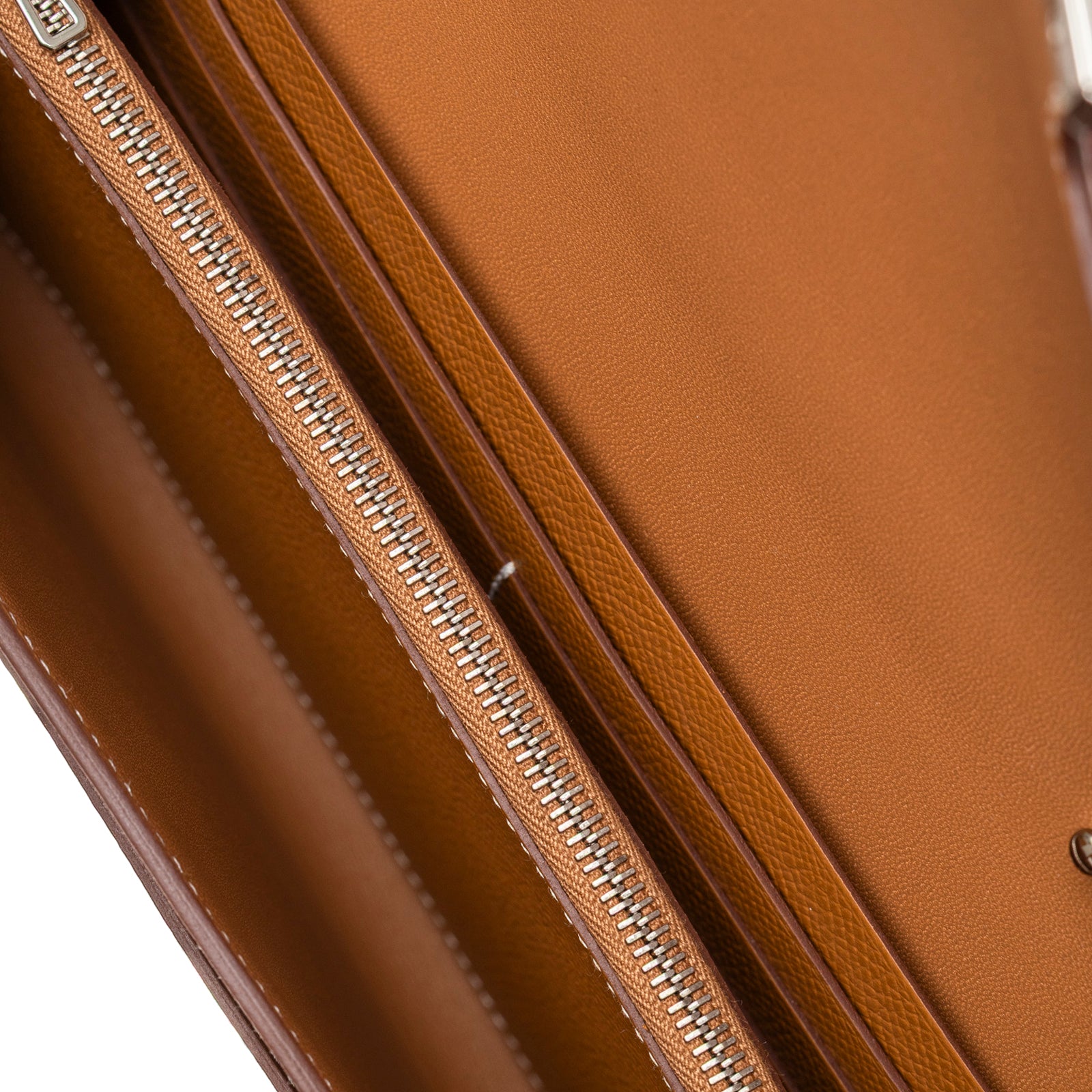 Close-up of interior zipper and card slots on Hermès Constance To Go Wallet Gold Epsom Palladium Hardware showing smooth leather lining