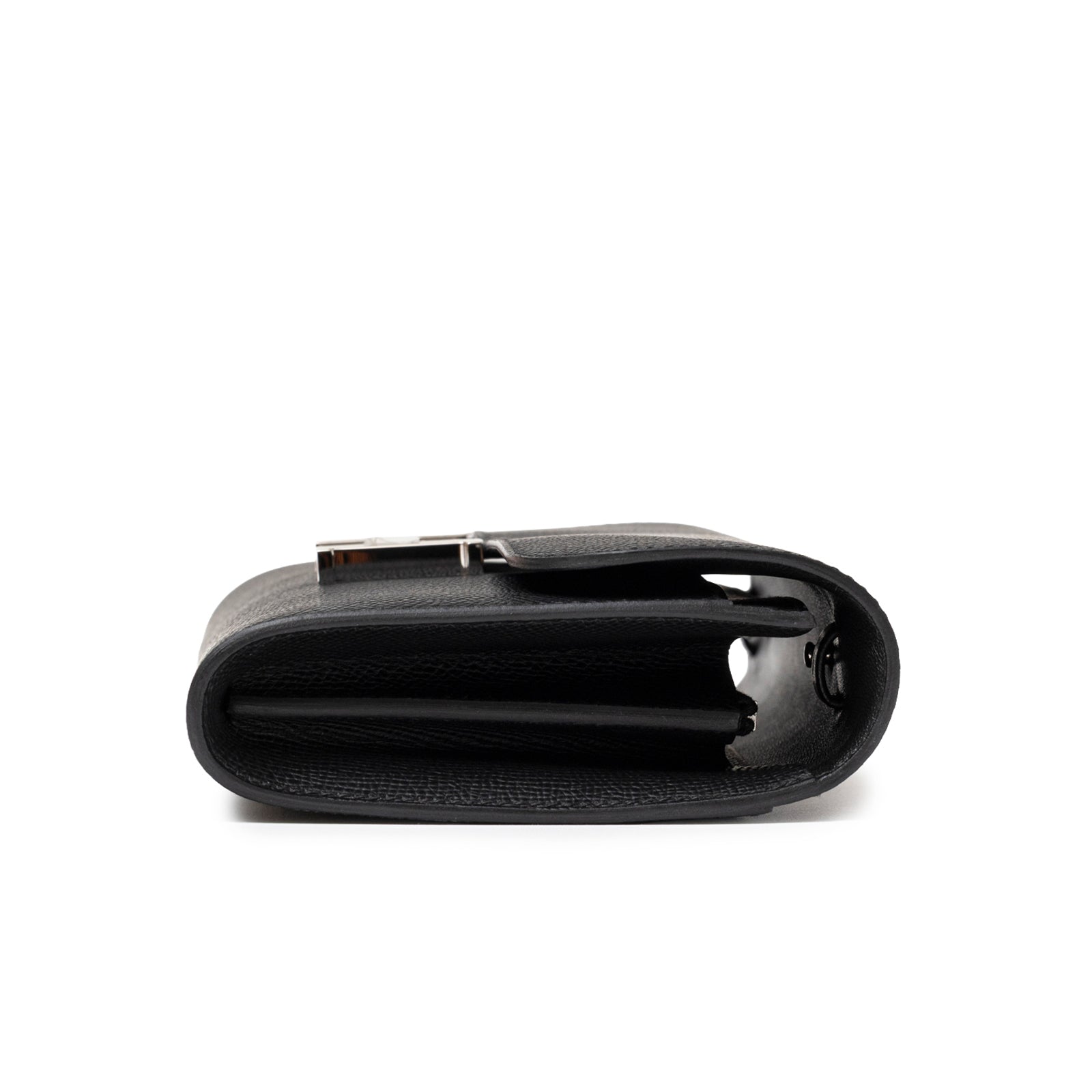 Top-down view of Hermès Constance To Go Wallet Black Epsom Palladium Hardware showing folded edges and sleek profile.