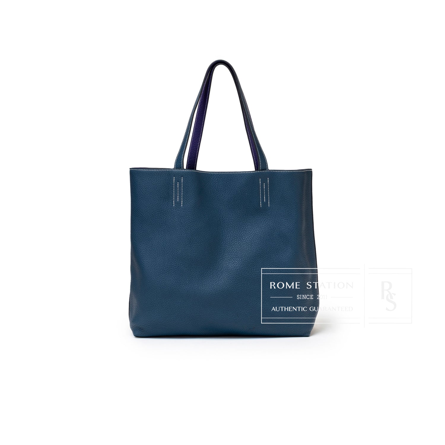 Front view of Hermès Double Sens Reversible Bicolor Shoulder Bag Clemence Violet/Blue in smooth blue leather with violet handles