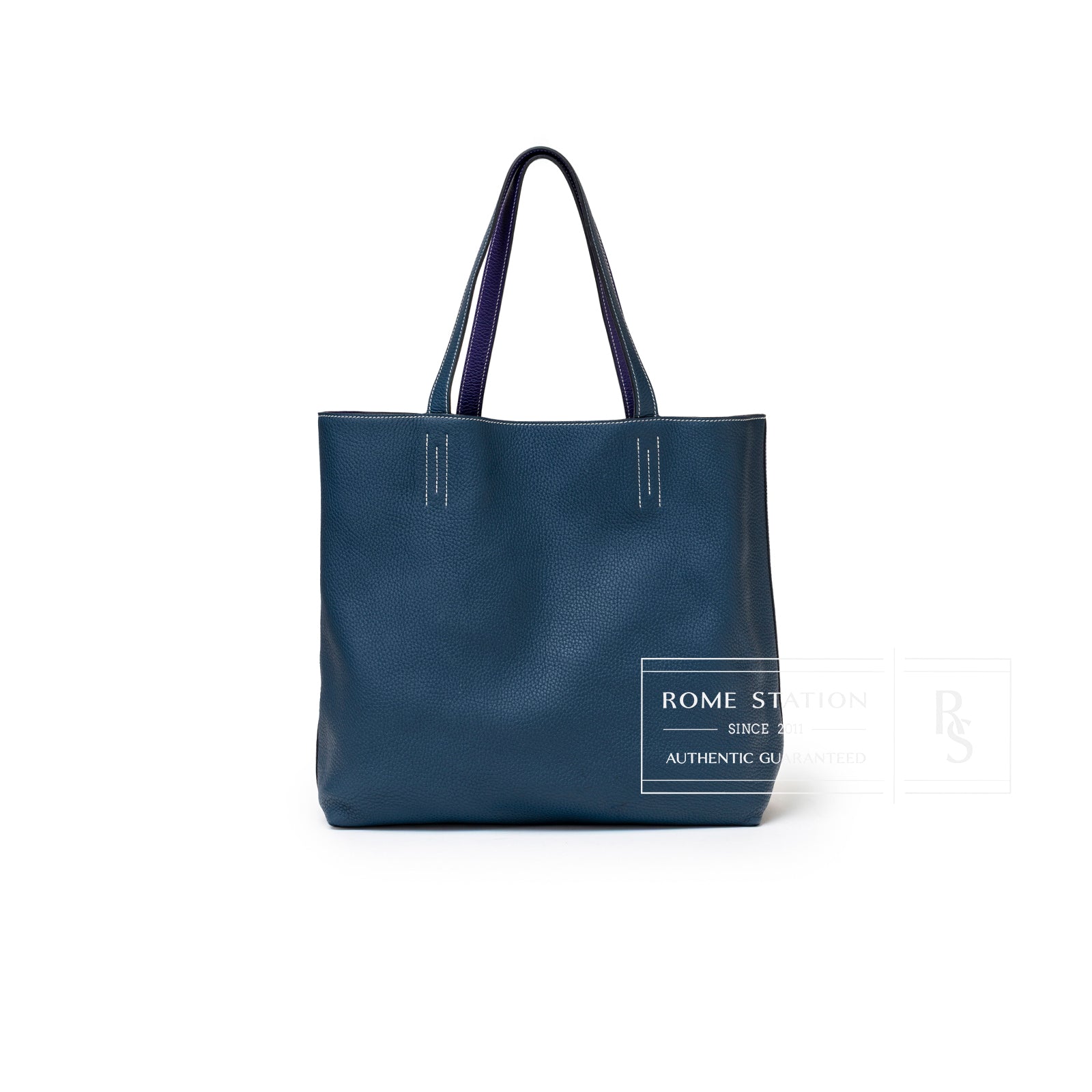 Front view of Hermès Double Sens Reversible Bicolor Shoulder Bag Clemence Violet/Blue in smooth blue leather with violet handles