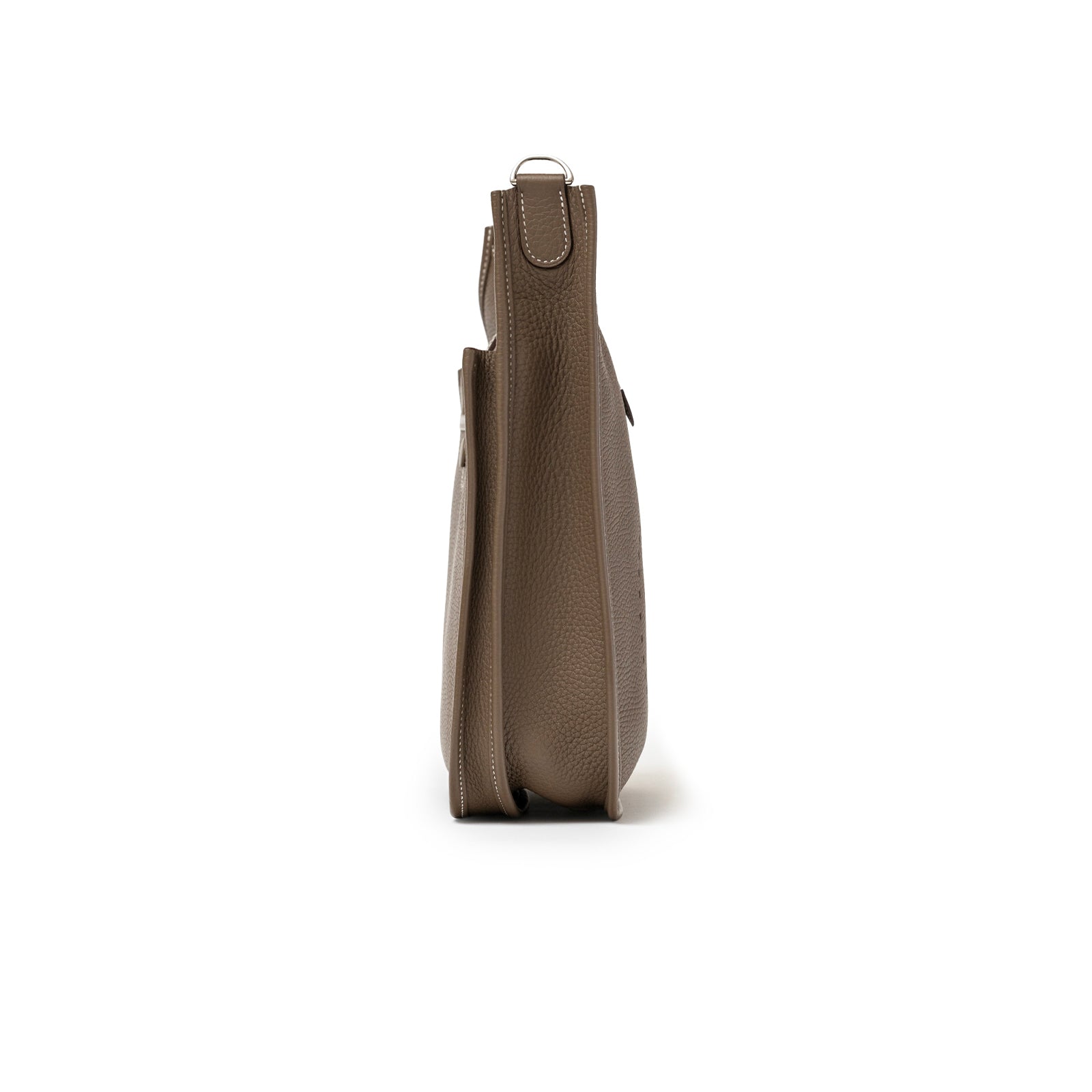 Side view of Hermès Evelyne PM 29 Etoupe Clemence Palladium Hardware showing textured leather and slim profile