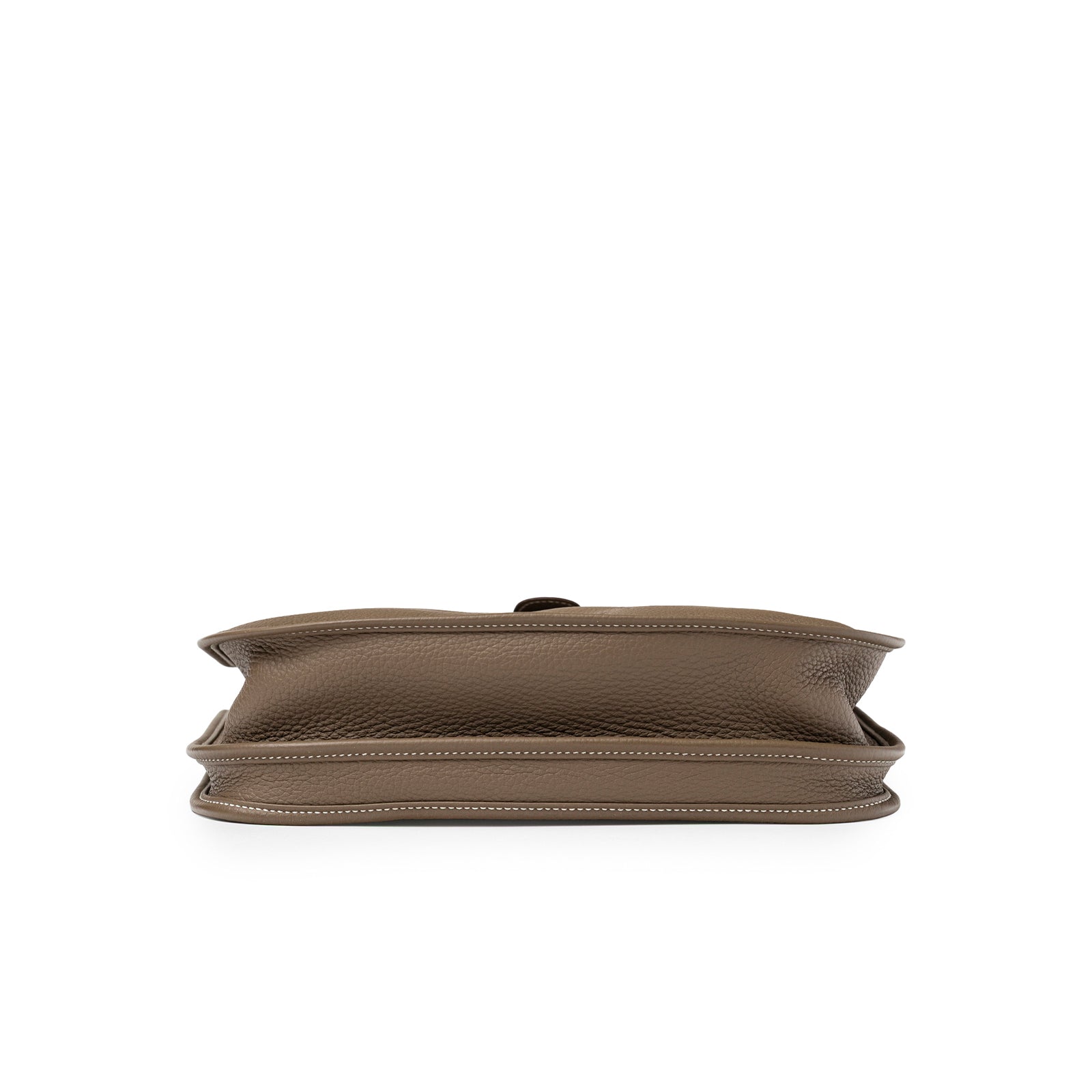 Bottom view of Hermès Evelyne PM 29 Etoupe Clemence Palladium Hardware showing leather texture and stitching detail