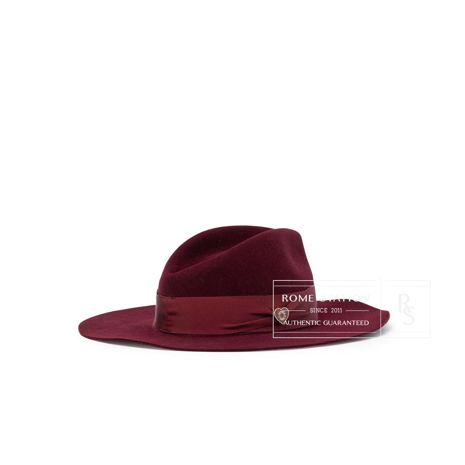 Hermès Felt Hat Red Lacquered Brass Heart shown from left side with deep red felt and satin band detail