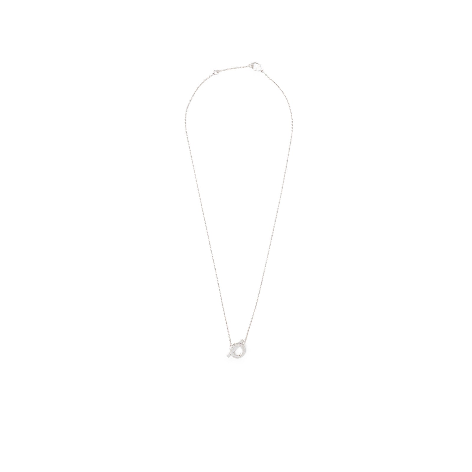 Top-down view of Hermès Finesse Pendant Diamonds and 18k White Gold necklace with delicate chain and circular pendant