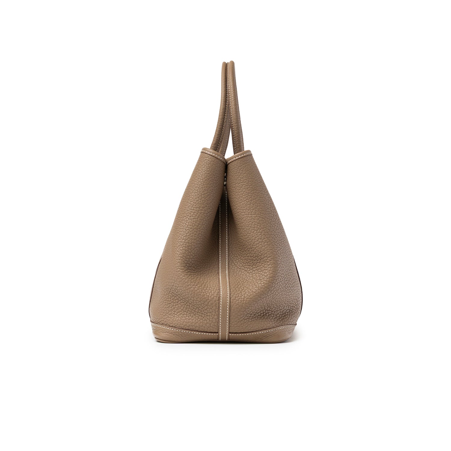 Side view of Hermès Garden Party 36 Etoupe Negonda Palladium Hardware showing textured leather and handle details