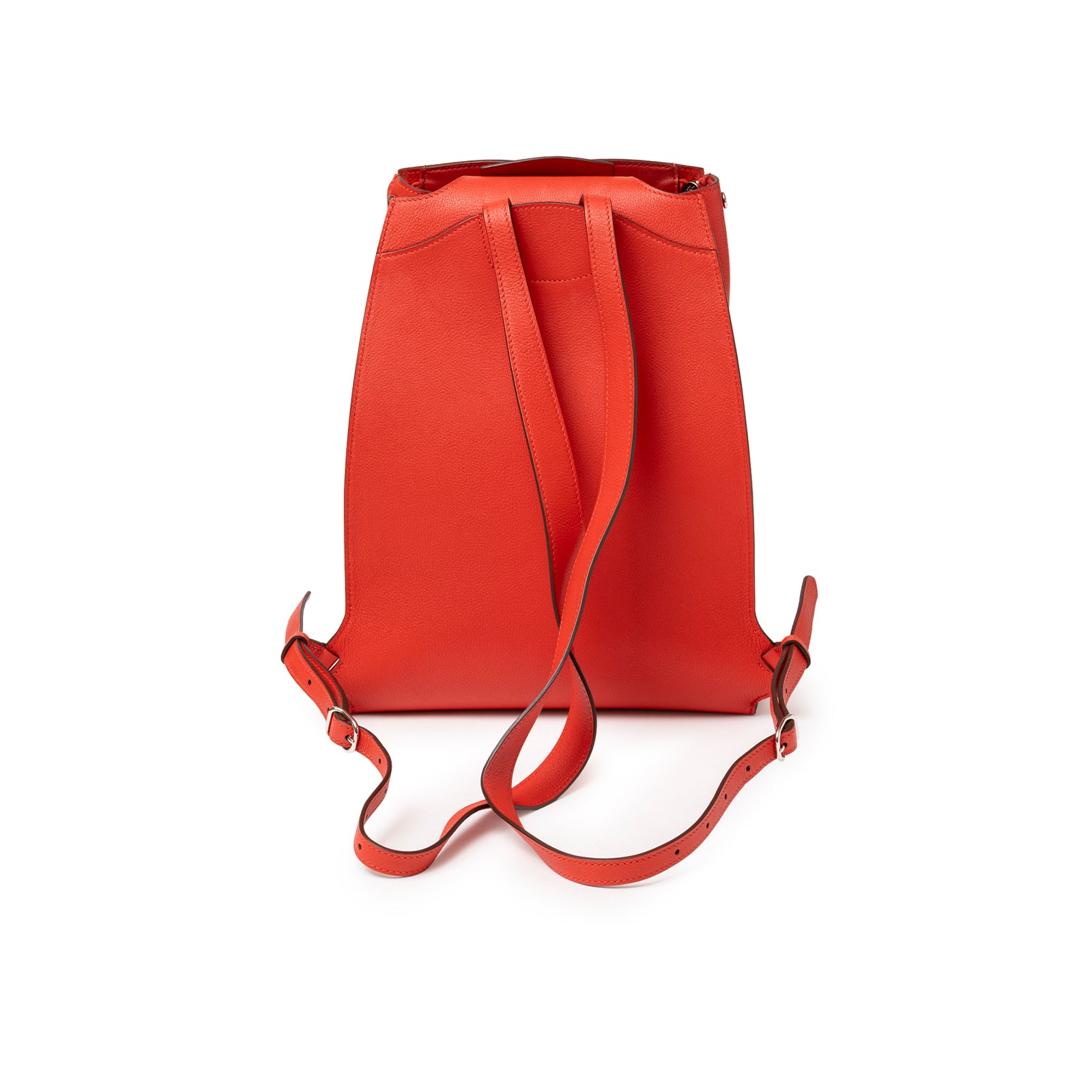 Back view of Hermès Gr24 Backpack Rouge Tomate Evercolor Palladium Hardware showing red leather straps and smooth finish
