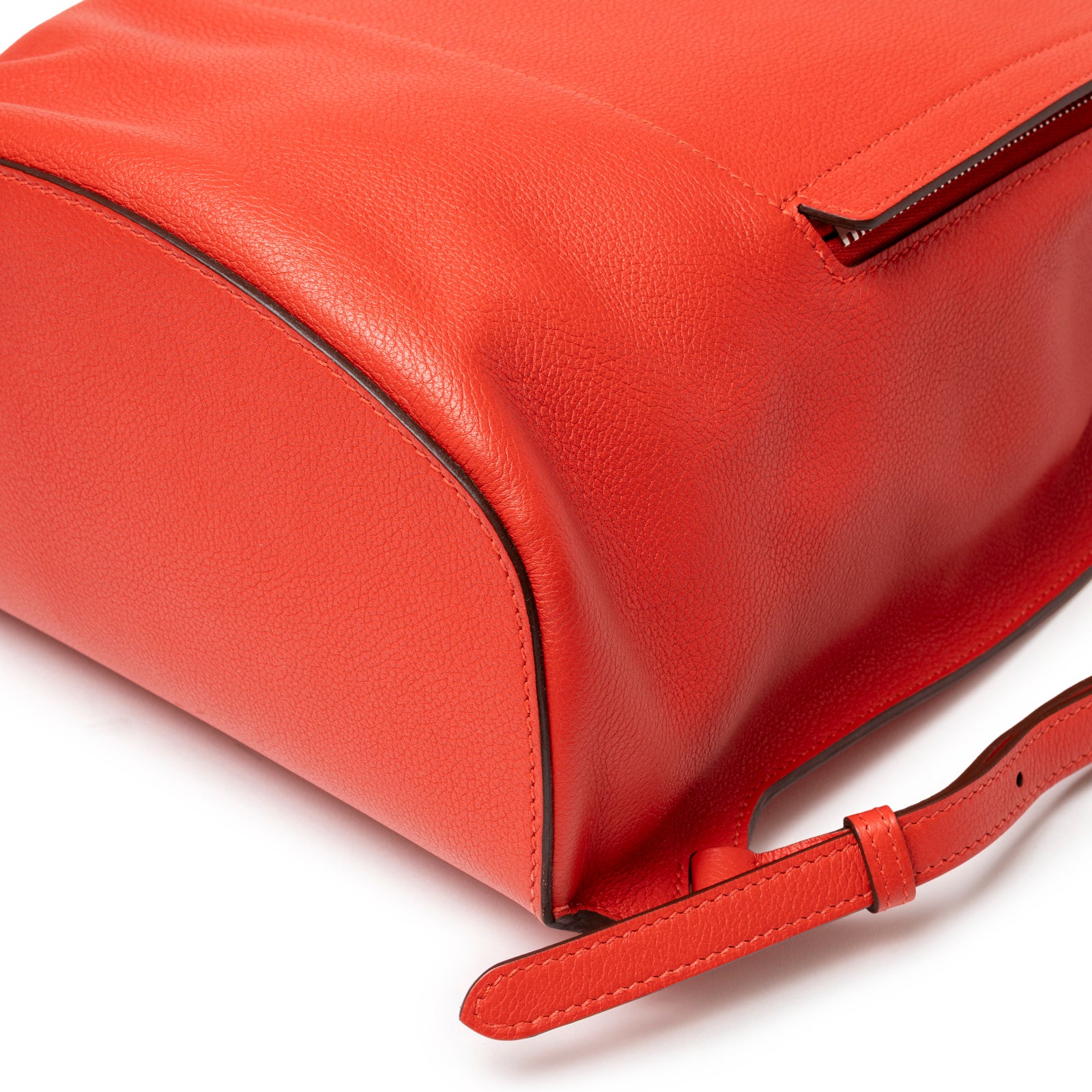 Close-up of Hermès Gr24 Backpack Rouge Tomate Evercolor Palladium Hardware showing smooth leather and strap detail