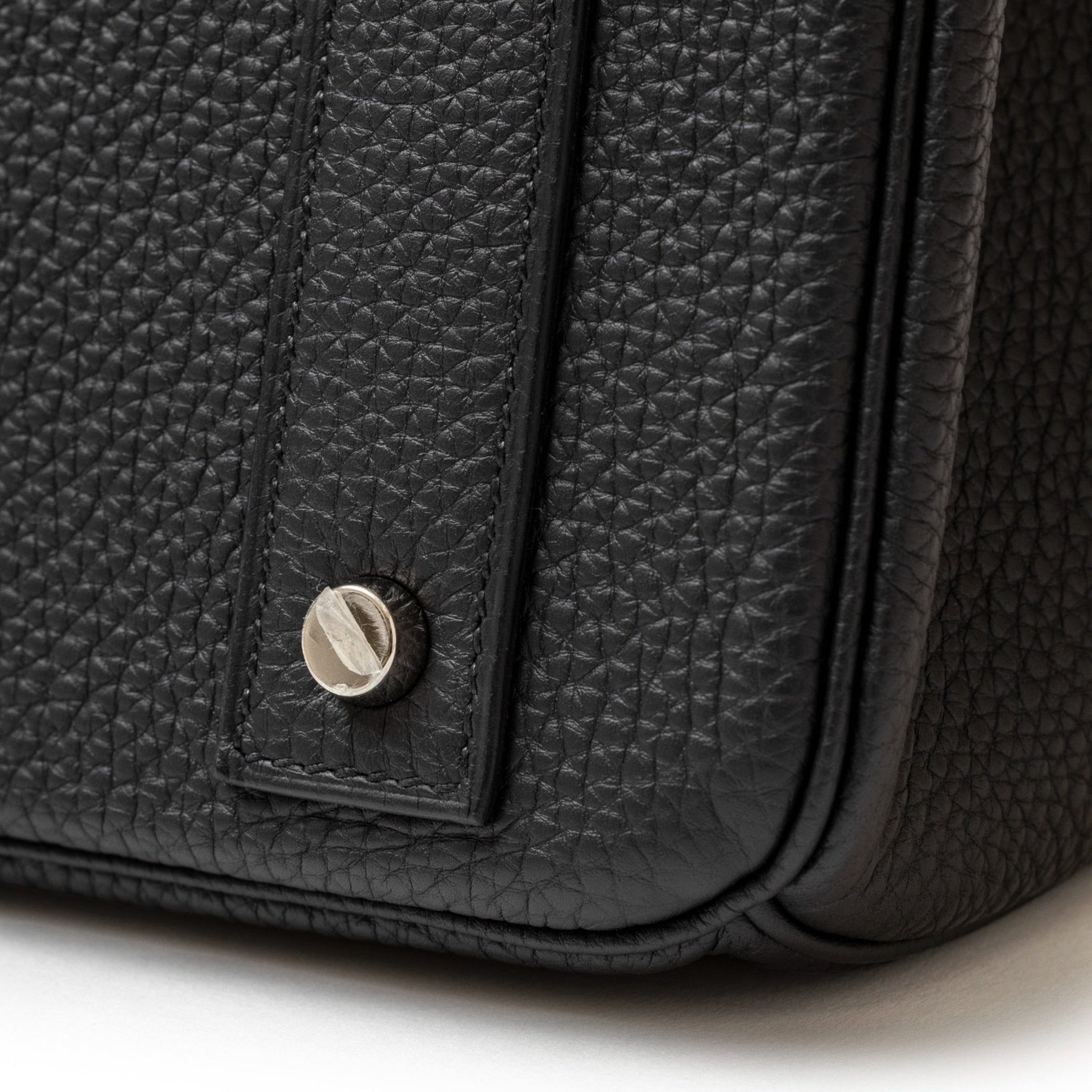 Close-up of Hermès Hac Birkin 40 Black Togo leather corner with palladium hardware detail.