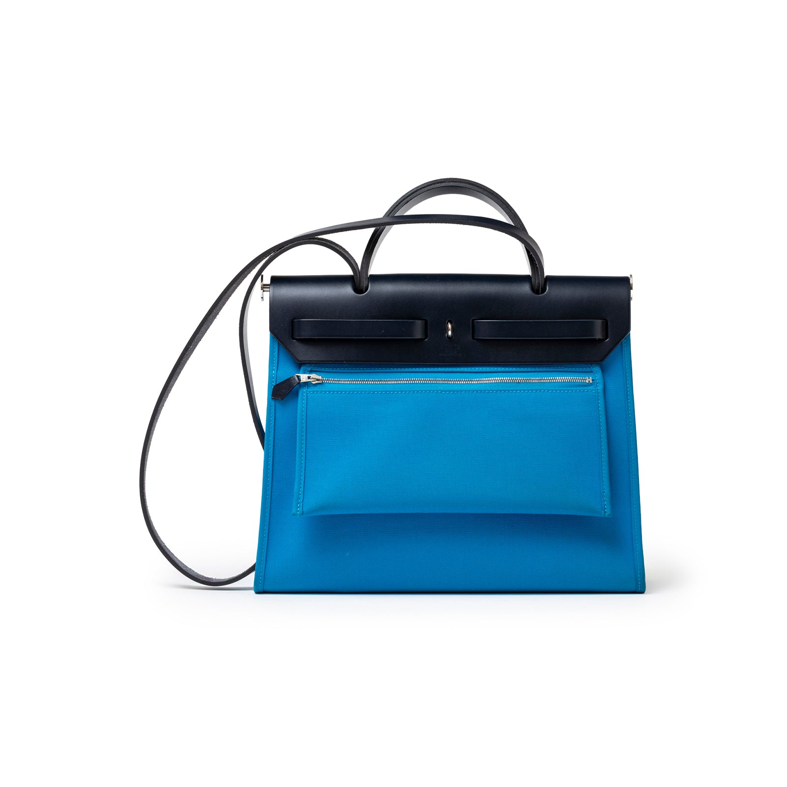 Back view of Hermès Herbag Zip PM 31 Blue Vache Hunter Palladium Hardware with shoulder strap and zip pocket.