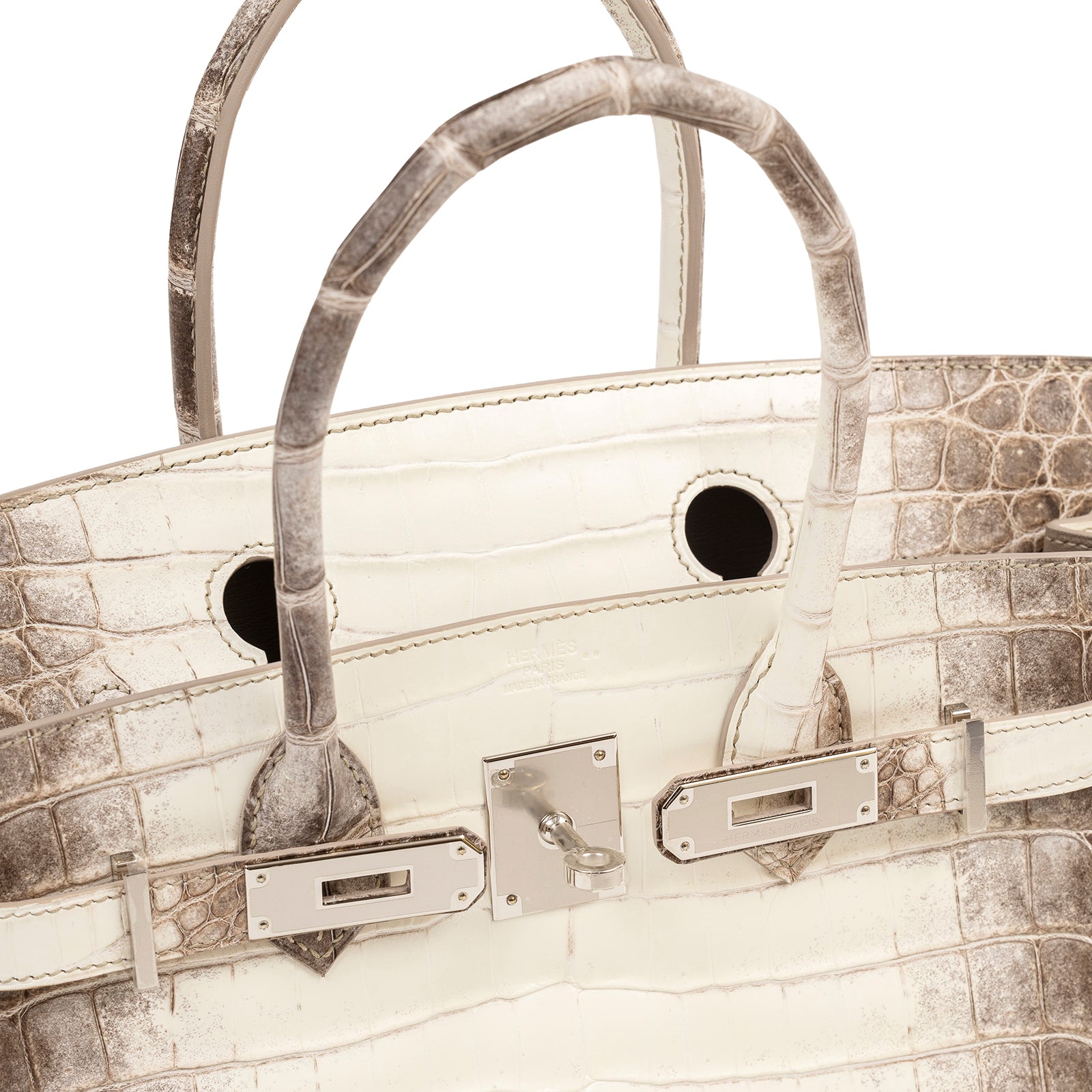 Close-up angled shot of Hermès Himalaya Birkin 30 Matte Niloticus Crocodile Palladium Hardware clasp and handles detail