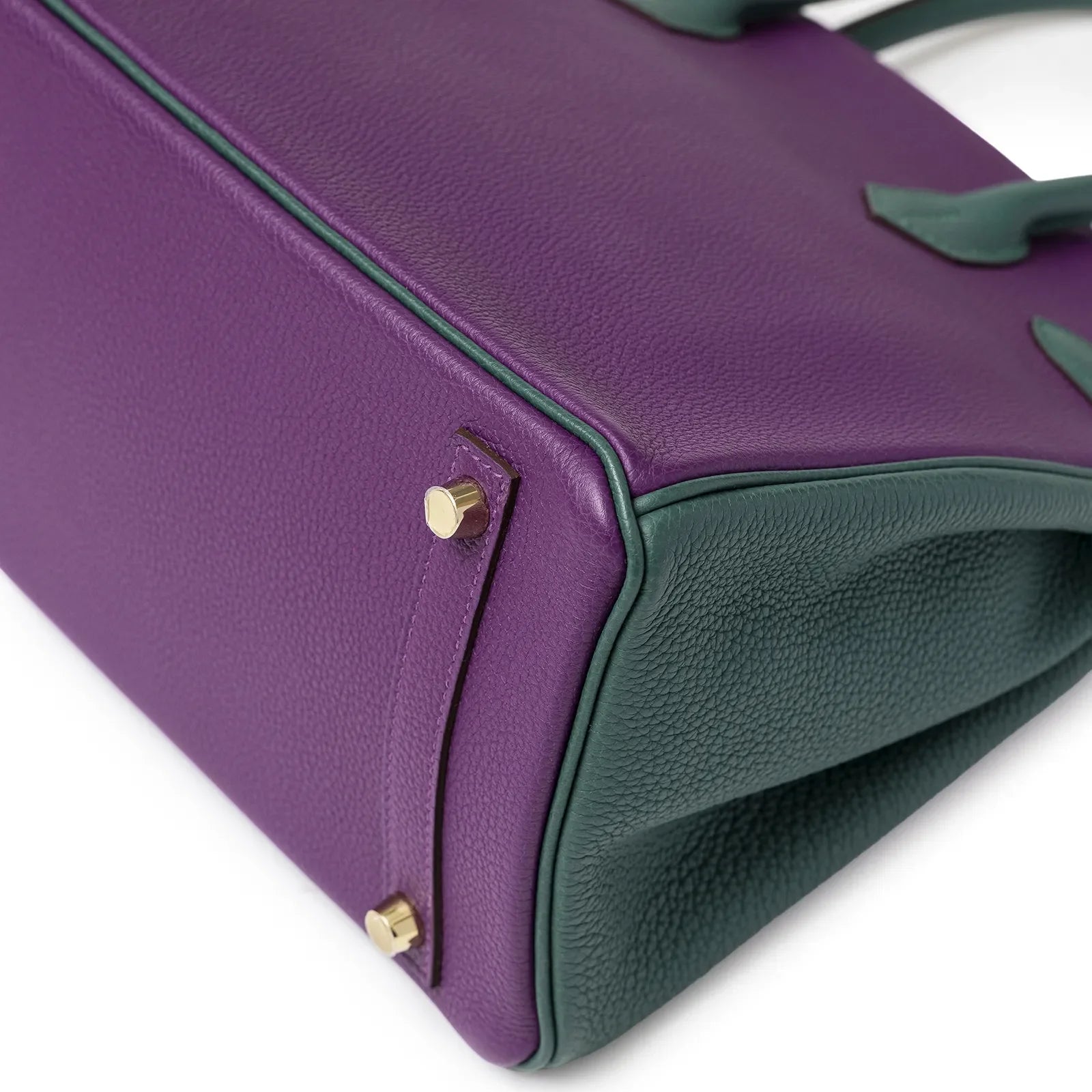 Close-up bottom view of Hermès Horseshoe Birkin 30 Anemone Malachite Togo leather with gold hardware.