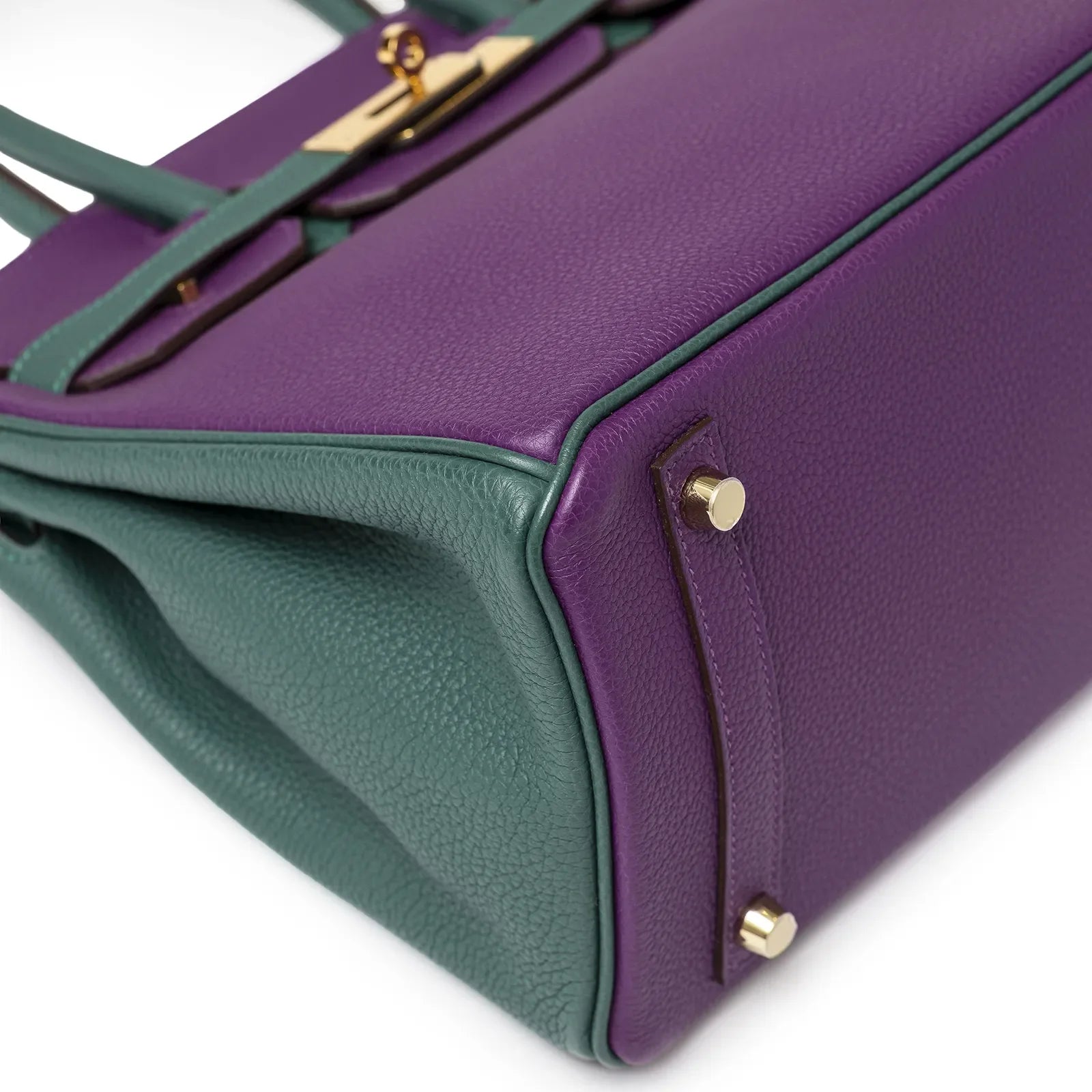 Close-up angled shot of Hermès Horseshoe Birkin 30 Anemone/Malachite Togo leather with gold hardware.