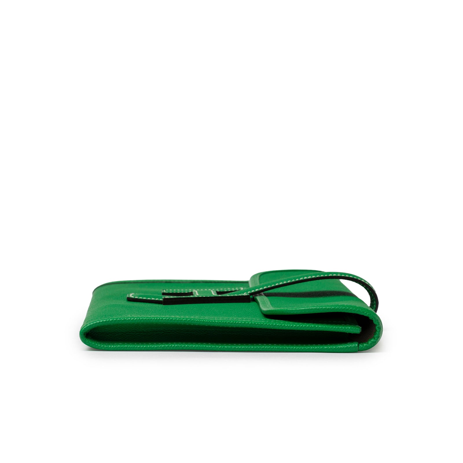 Hermès Jige PM Bamboo Green Epsom flat side view highlighting slim profile and white stitching detail