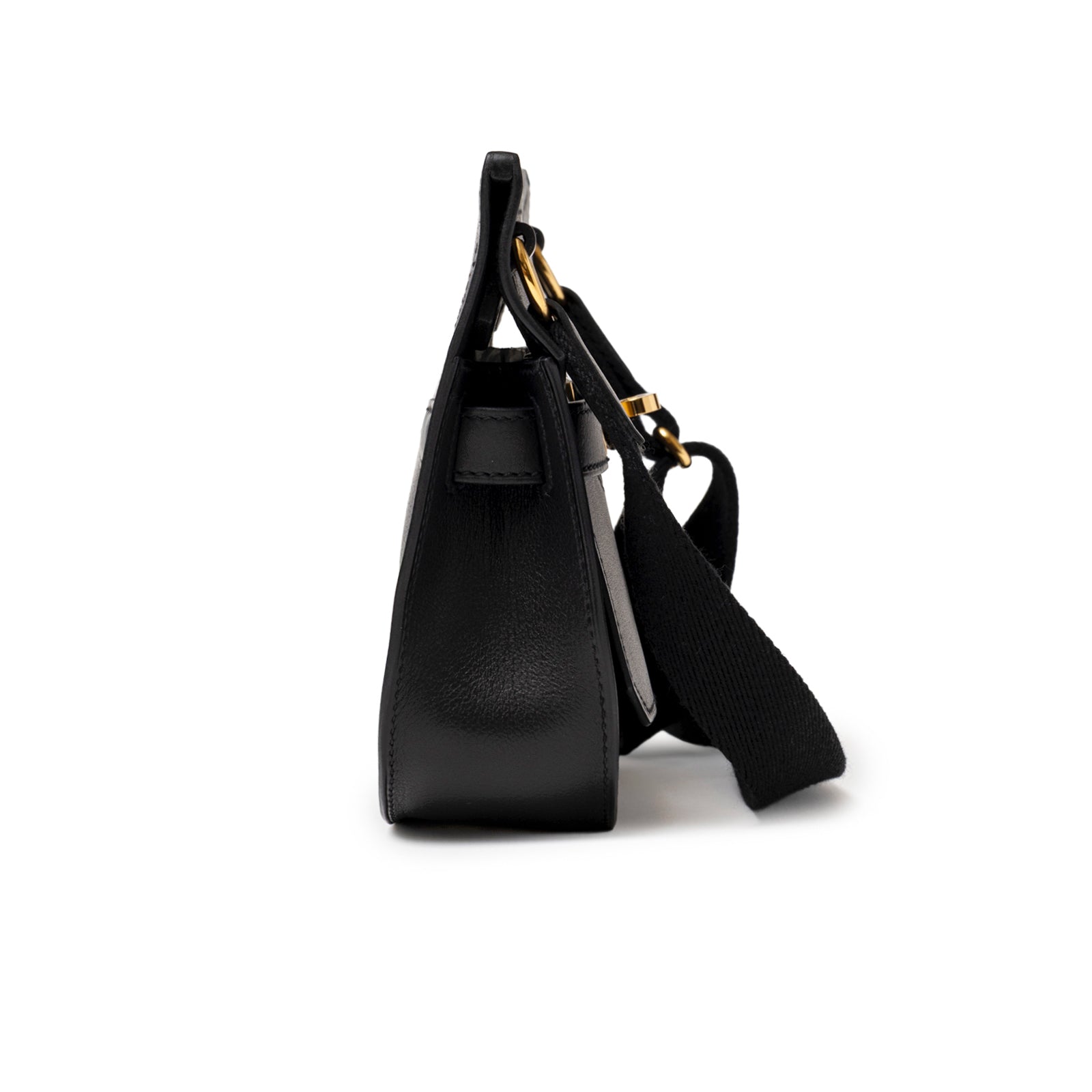 Side perspective of Hermès Jypsiere Mini Black Evergrain Gold Hardware highlighting structured silhouette and fabric strap attachment