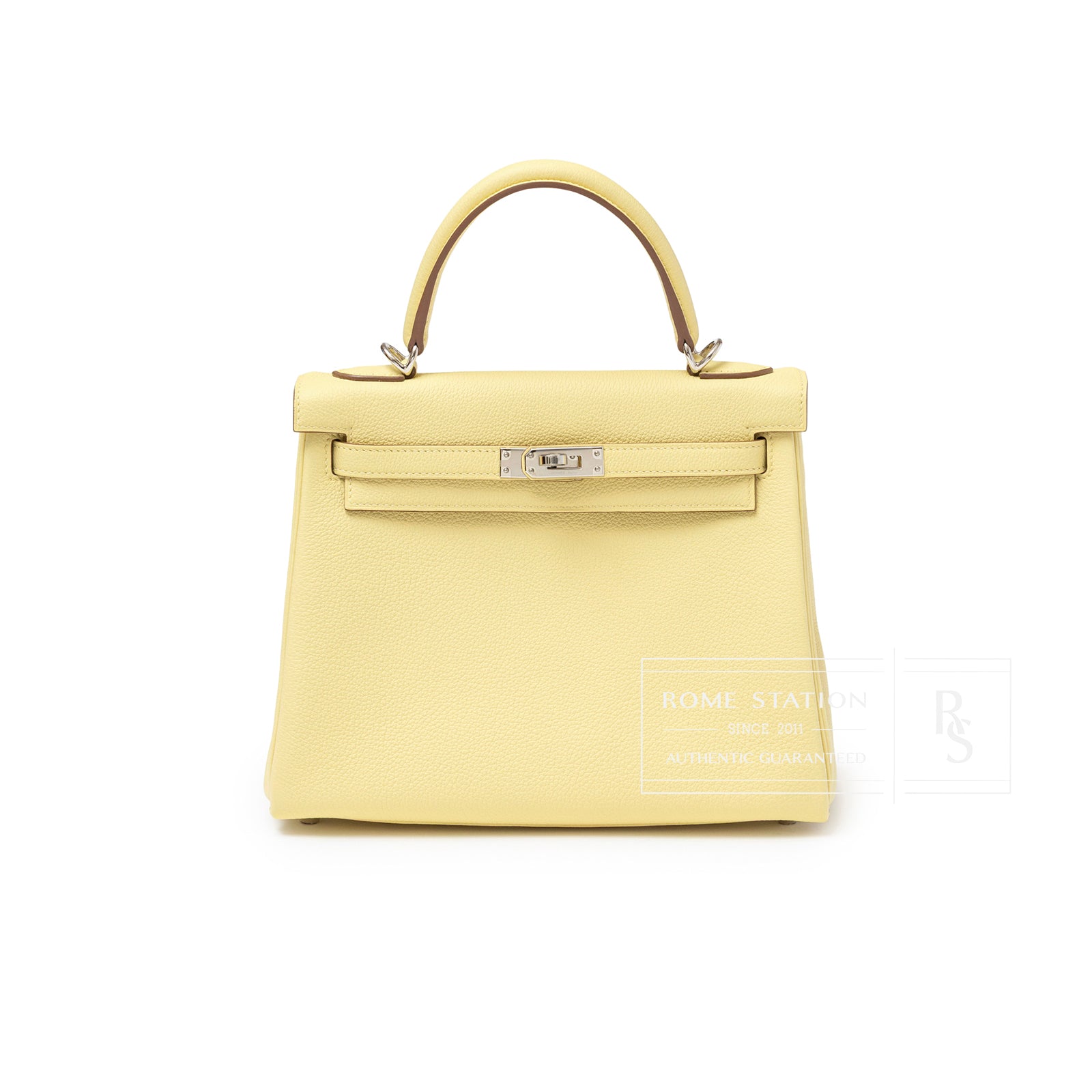 Front view of Hermès Kelly 25 Retourne Togo Jaune Poussin Palladium Hardware showing smooth leather and structured handle