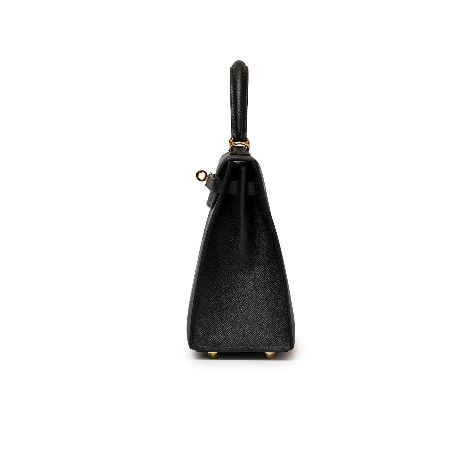 Side view of elegant Hermès Kelly 25 Sellier Black Epsom Gold hardware handbag showcasing structured silhouette and fine craftsmanship