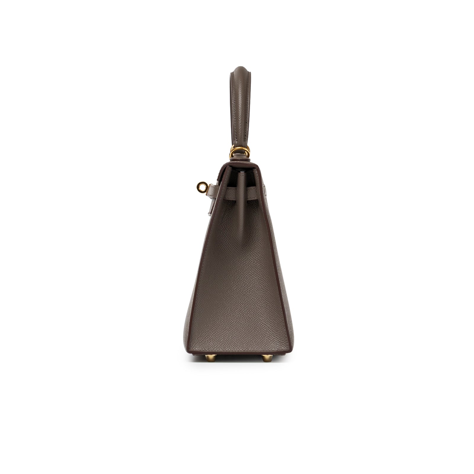 Side profile of Hermès Kelly 25 Sellier Etain Epsom Gold Hardware showing structured leather and gold feet detail