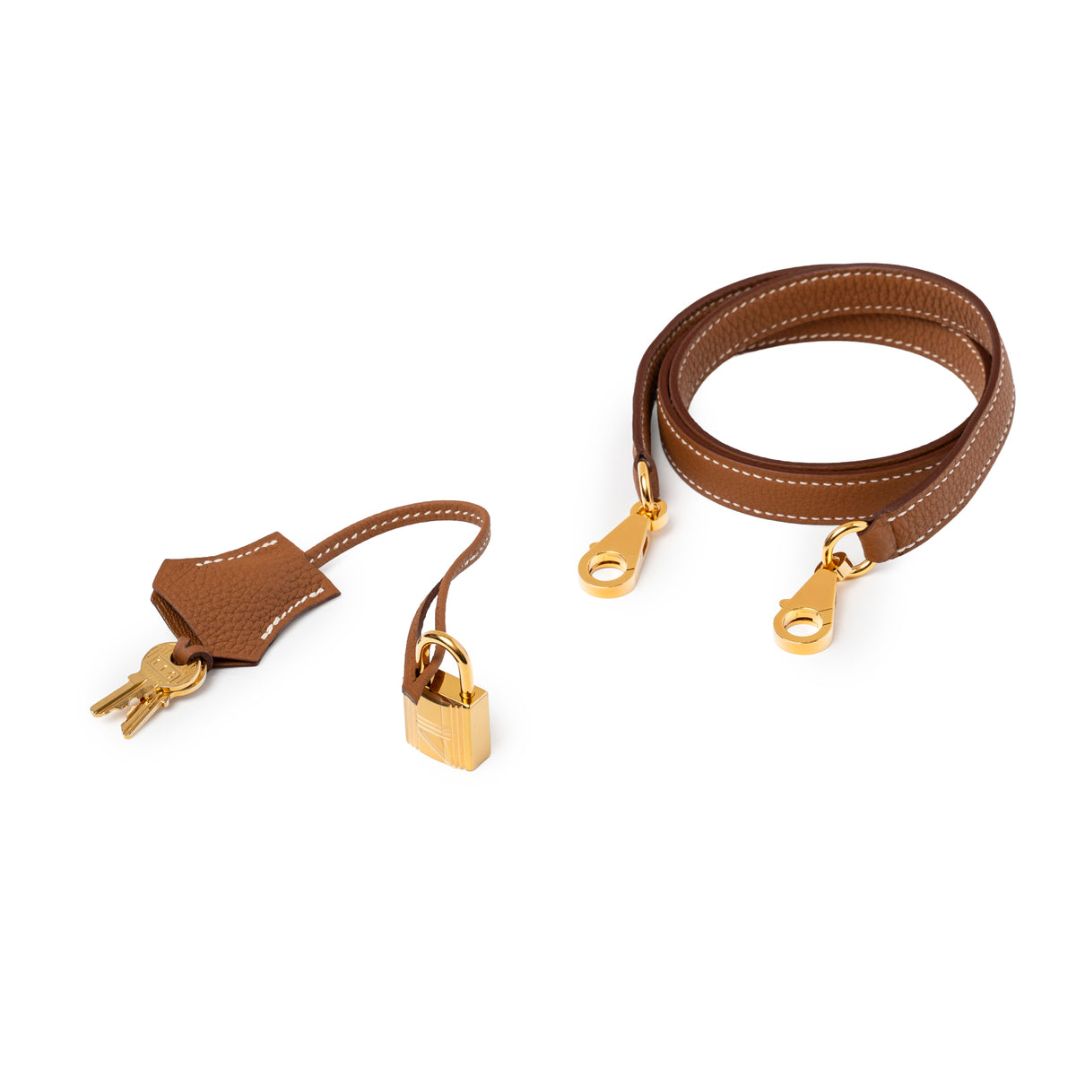 Hermès Kelly 28 Gold Retourne Togo Gold Hardware strap with lock keys and clochette displayed