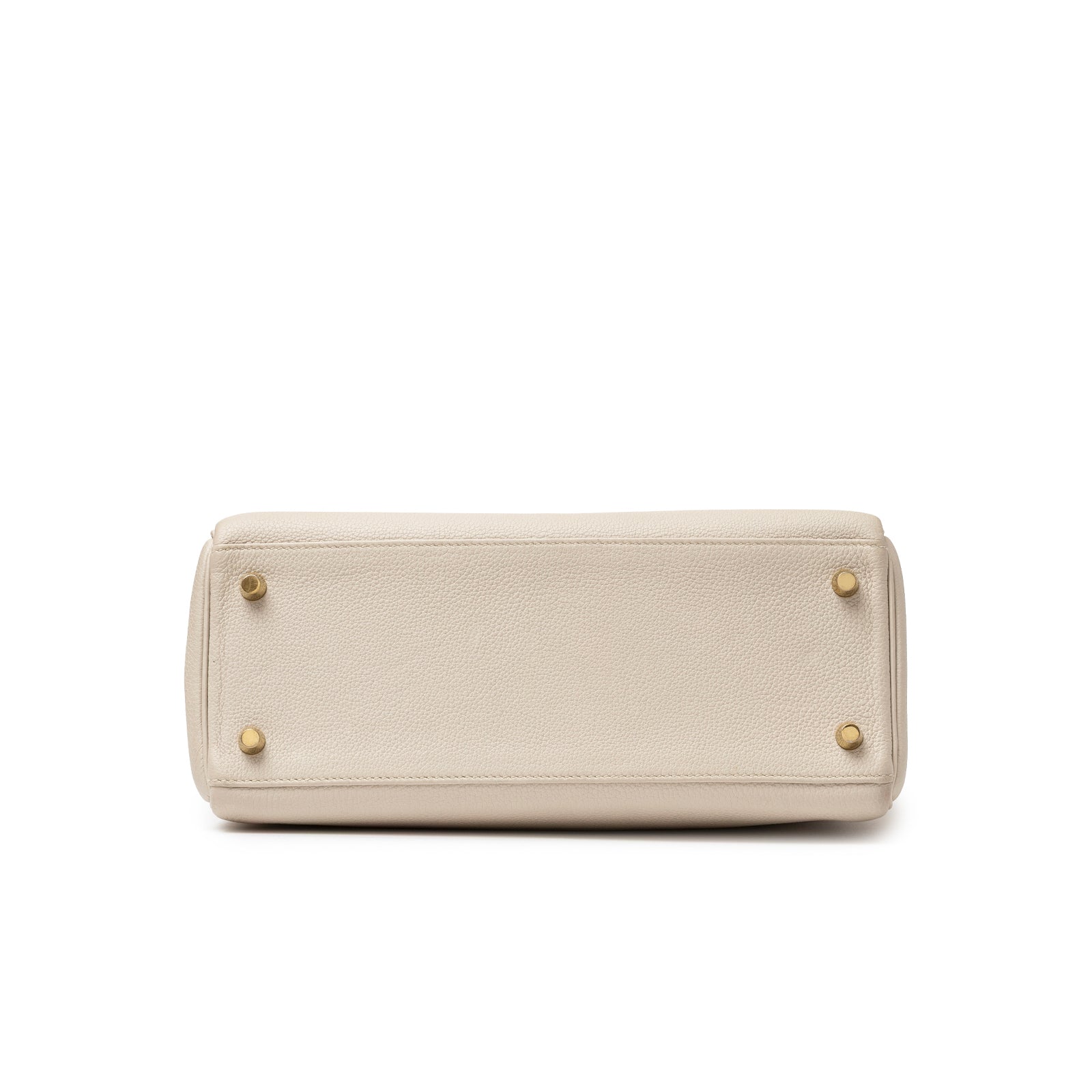 Bottom view of Hermès Kelly 28 Retourne Beton Togo Gold Hardware showing textured leather and protective feet