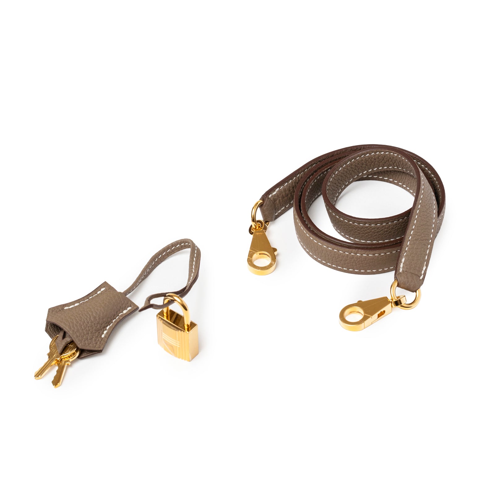 Gold padlock with two keys in Etoupe Togo leather clochette and detachable strap for Hermès Kelly 28 Retourne Etoupe Togo Gold Hardware