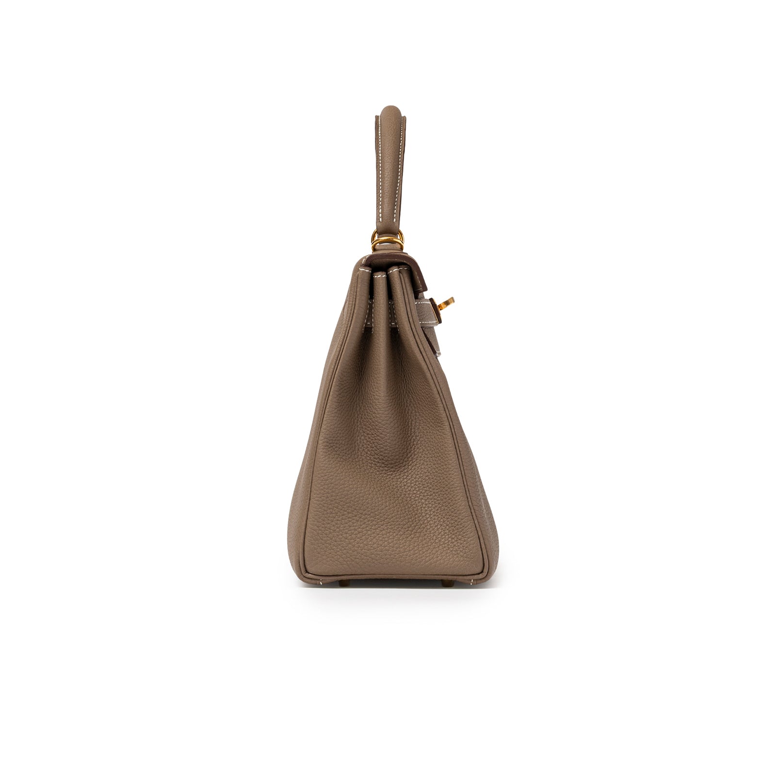 Side view of Hermès Kelly 28 Retourne Etoupe Togo Gold Hardware showing textured leather and handle detail