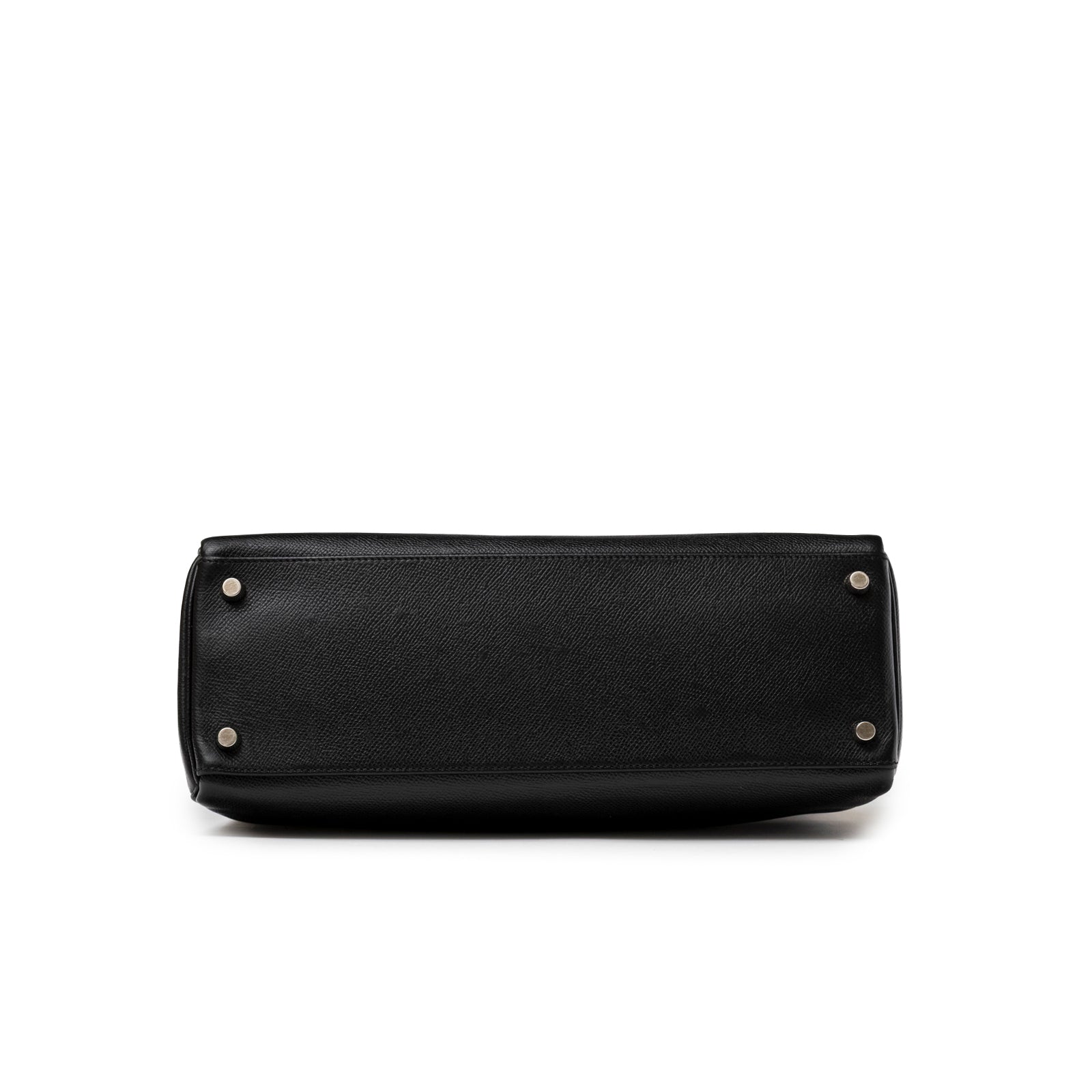Bottom view of Hermès Kelly 32 Black Epsom Palladium Hardware showing textured leather and protective metal feet