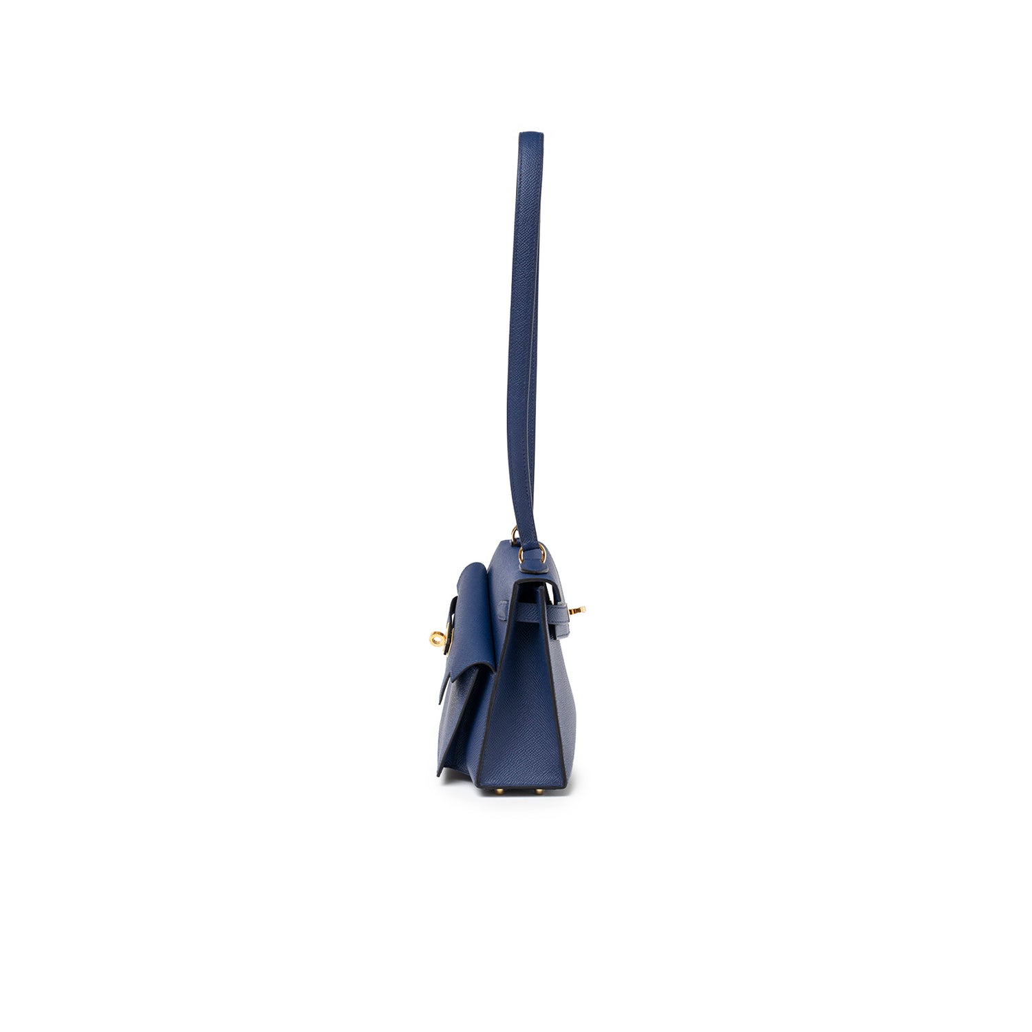 Side profile of Hermès Kelly Desordre 20 Sellier Blue Saphir Epsom Gold Hardware handbag showing strap and clasp details