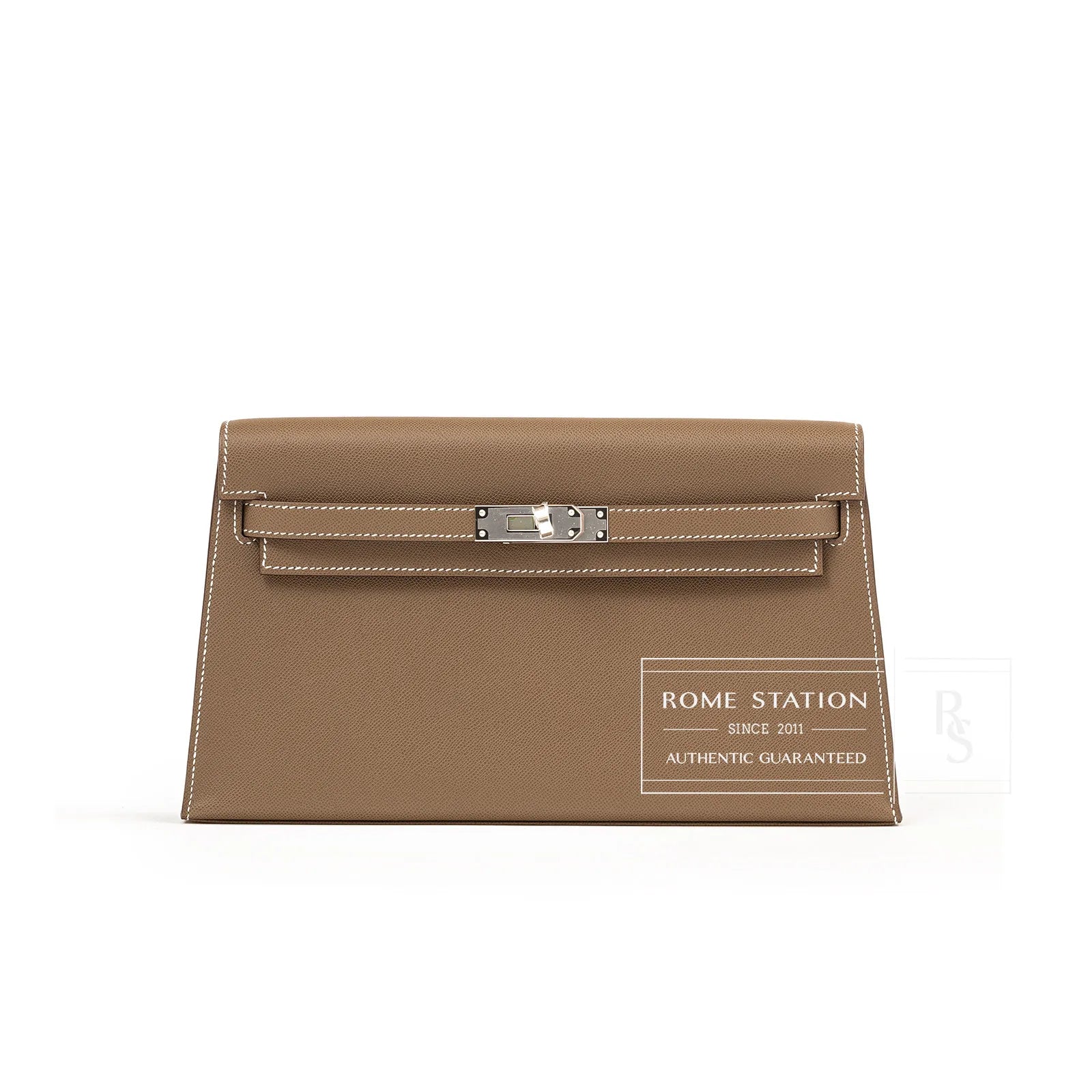 Front view of Hermès Kelly Elan Etoupe Madame Palladium Hardware clutch showcasing smooth leather and polished clasp detail