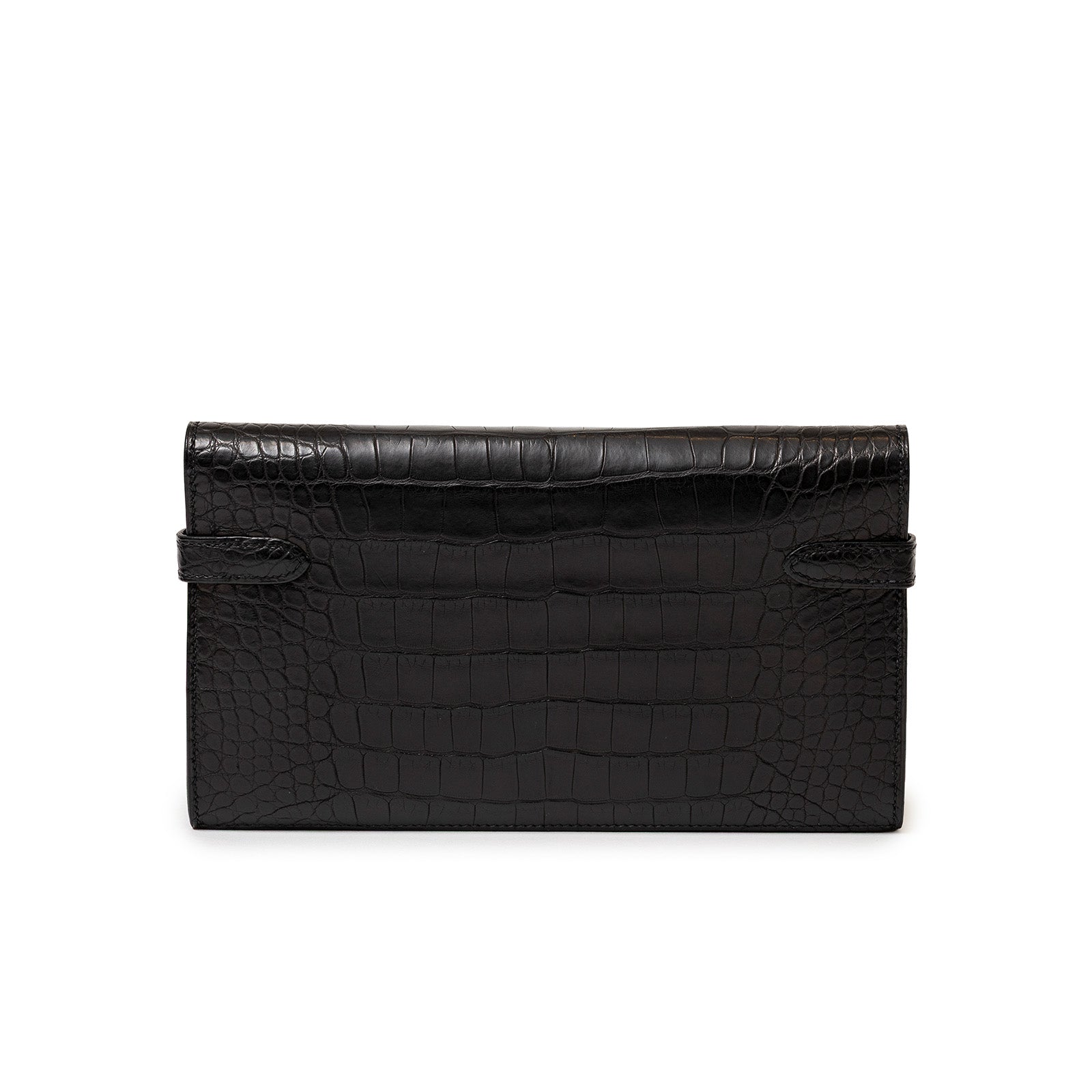 Back view of Hermès Kelly Long Wallet Black Matte Alligator Palladium Hardware showing textured design and clasp straps.