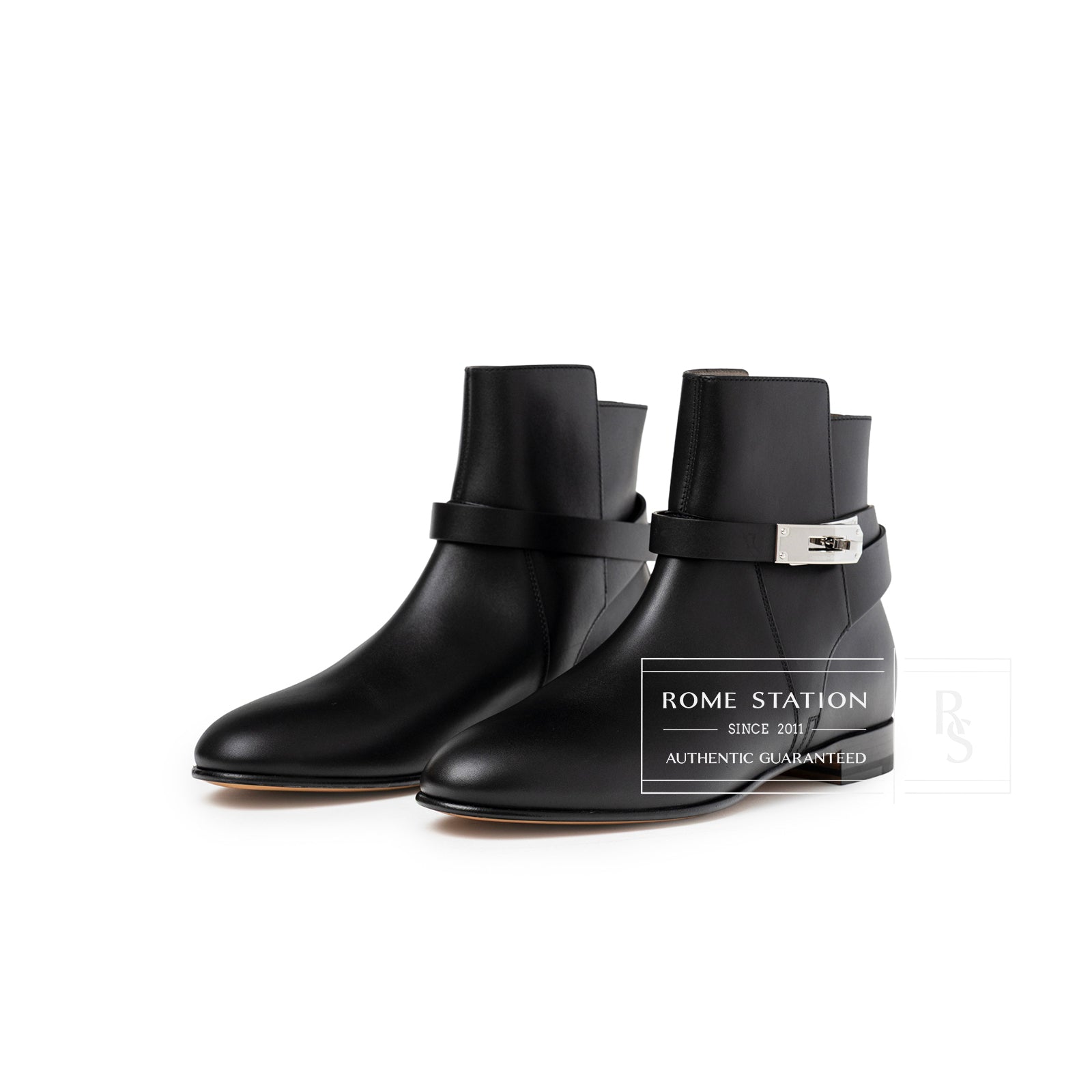 Angled front view of Hermès Kelly Neo Ankle Boot Black Palladium Plated showing smooth calf leather and hardware detail