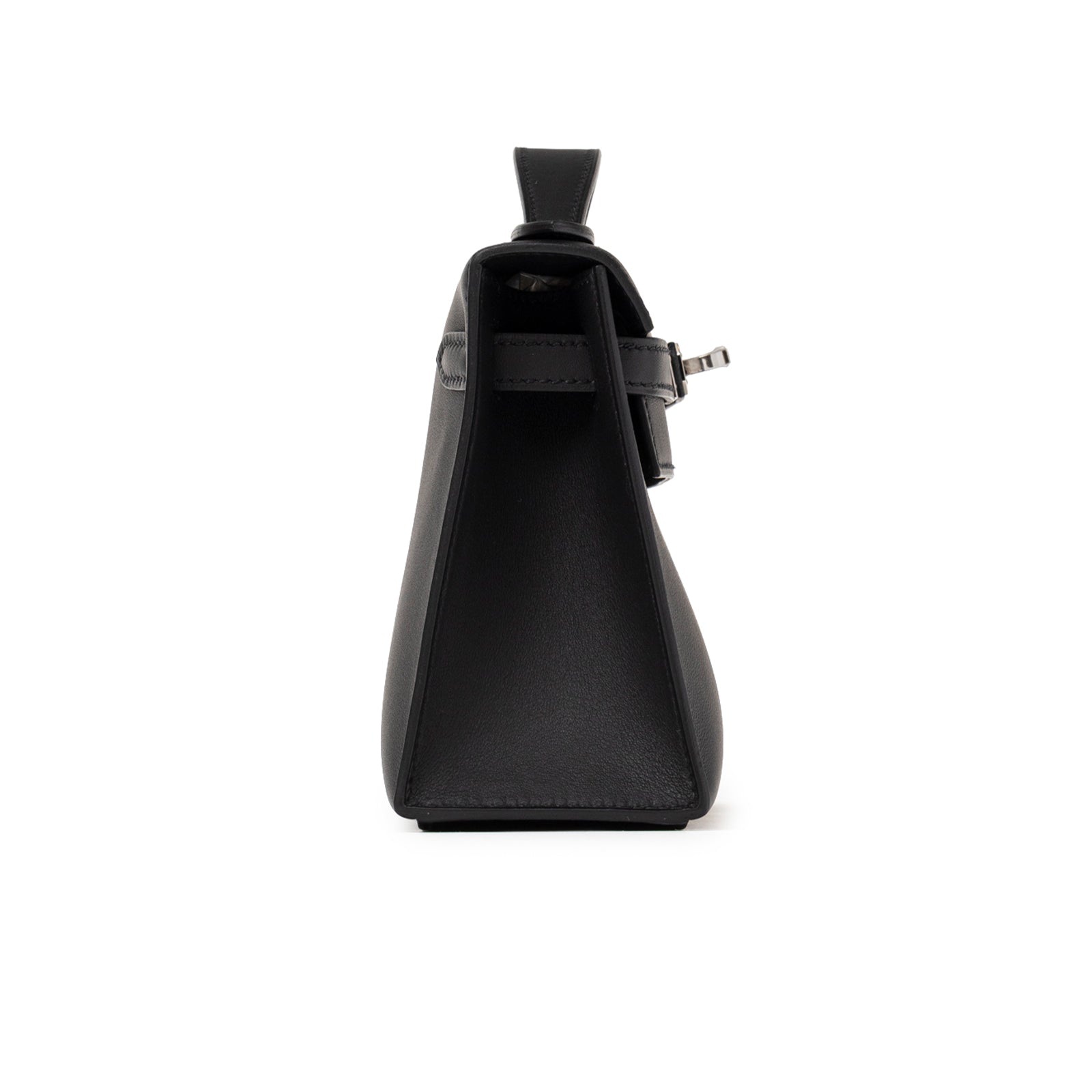 Side profile of Hermès Kelly Pochette Black Swift Palladium Hardware showing smooth leather and silver buckle detail