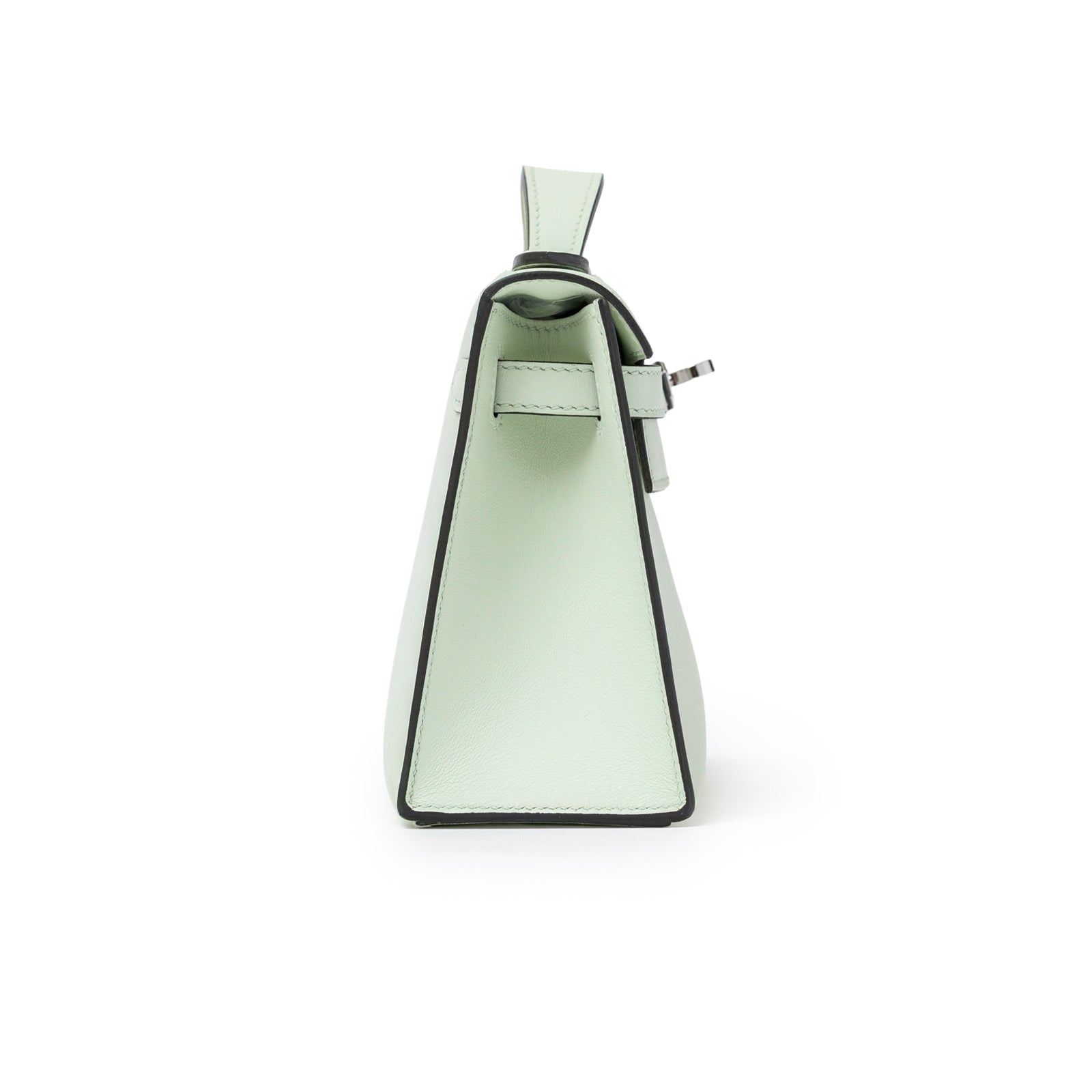 Side view of Hermès Kelly Pochette Vert Fizz Swift Palladium Hardware showing slim profile and clean lines