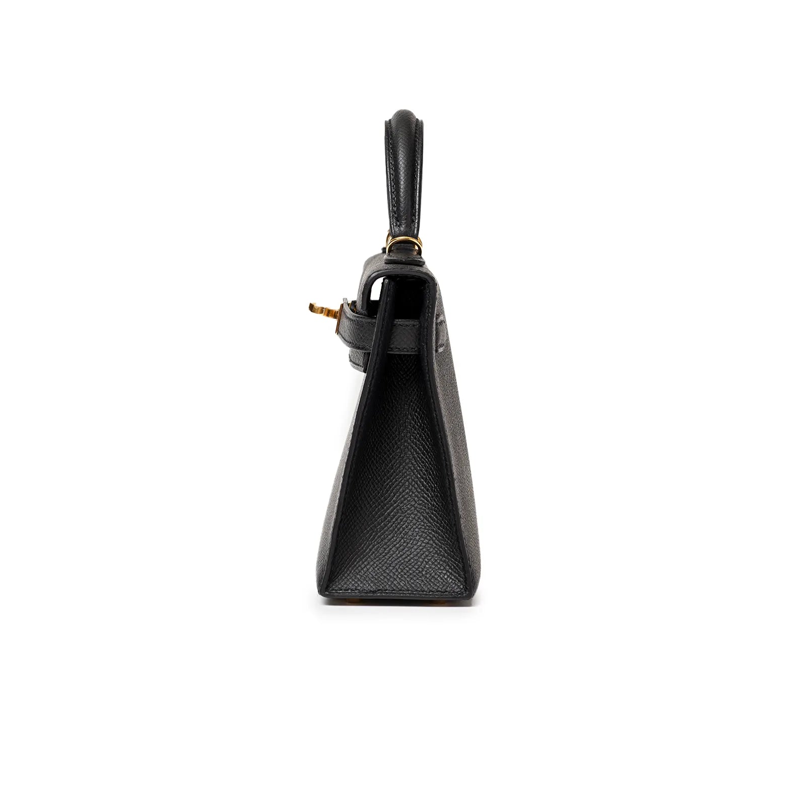 Side view of black leather handbag with gold clasp and textured design.