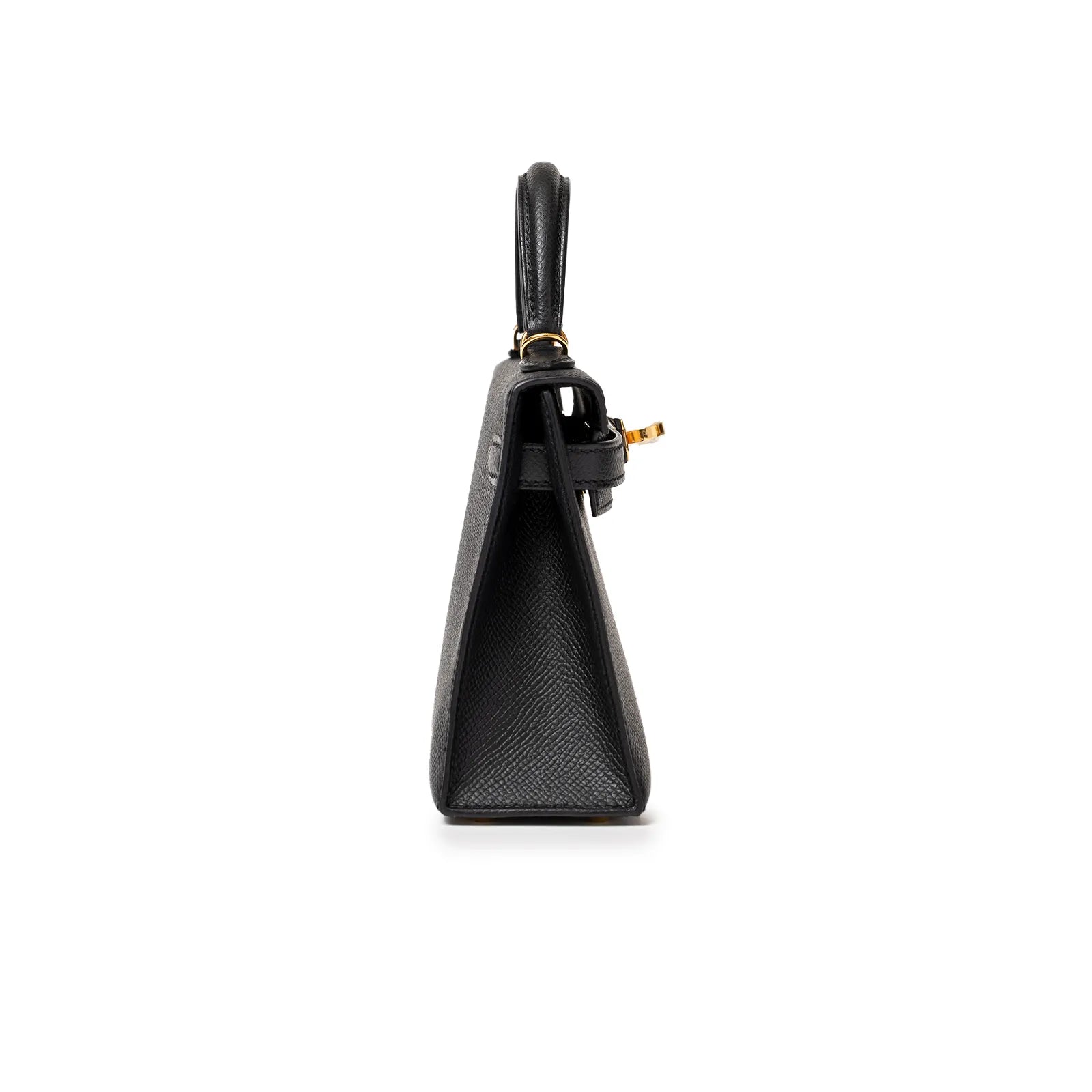 Side view of a black handbag with gold hardware and textured leather against a white background.