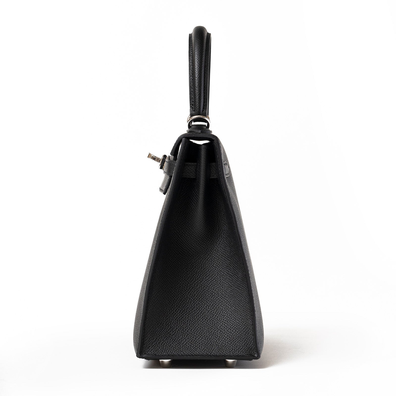 Side view of Hermès Kelly 25 Sellier Black Epsom Palladium Hardware showing textured leather and handle detail