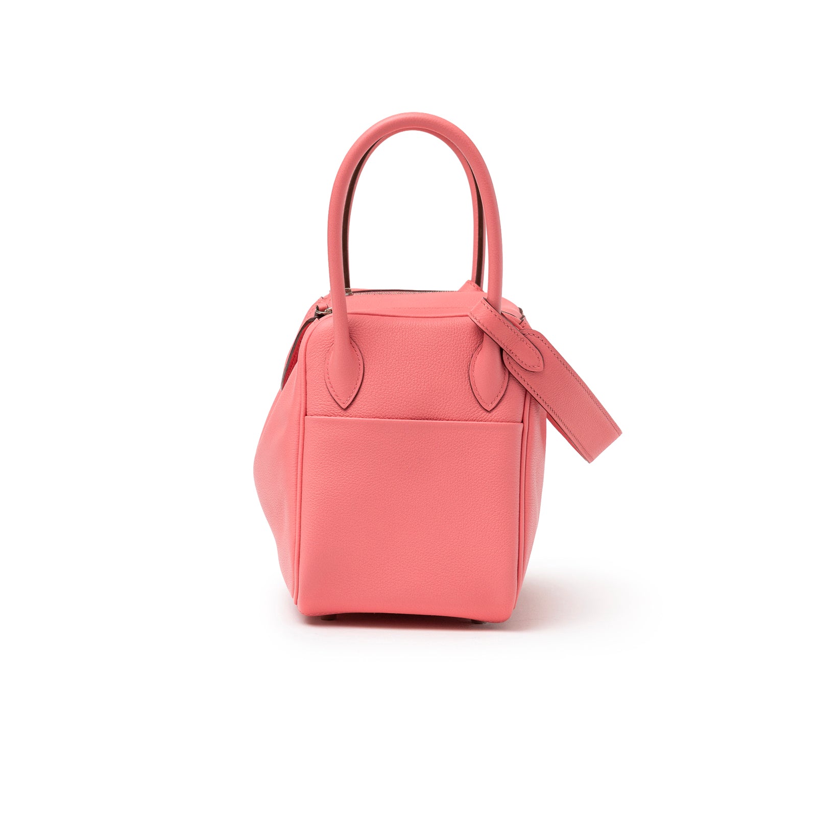 Side view of Hermès Lindy 26 Rose Azelee Evercolor Palladium Hardware showing handle and pocket detail