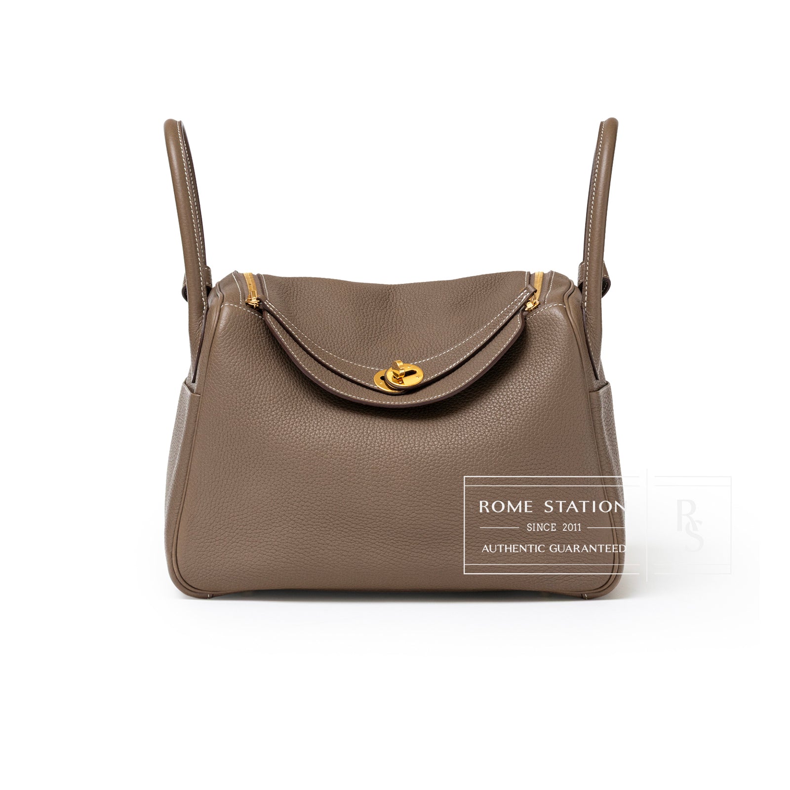 Front view of Hermès Lindy 30 Etoupe Clemence Gold Hardware handbag showing pebbled leather texture and clasp details