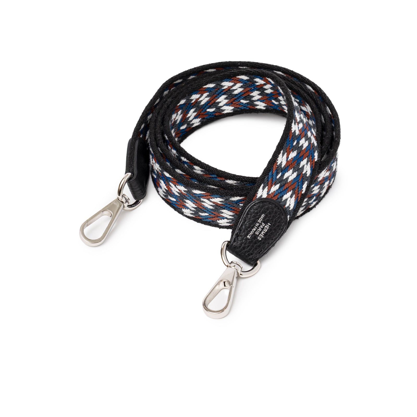 Detachable woven strap with black, white, and blue pattern featuring palladium hardware for Hermès Mini Evelyne Caban Blue Zellige Indigo Clemence Palladium Hardware