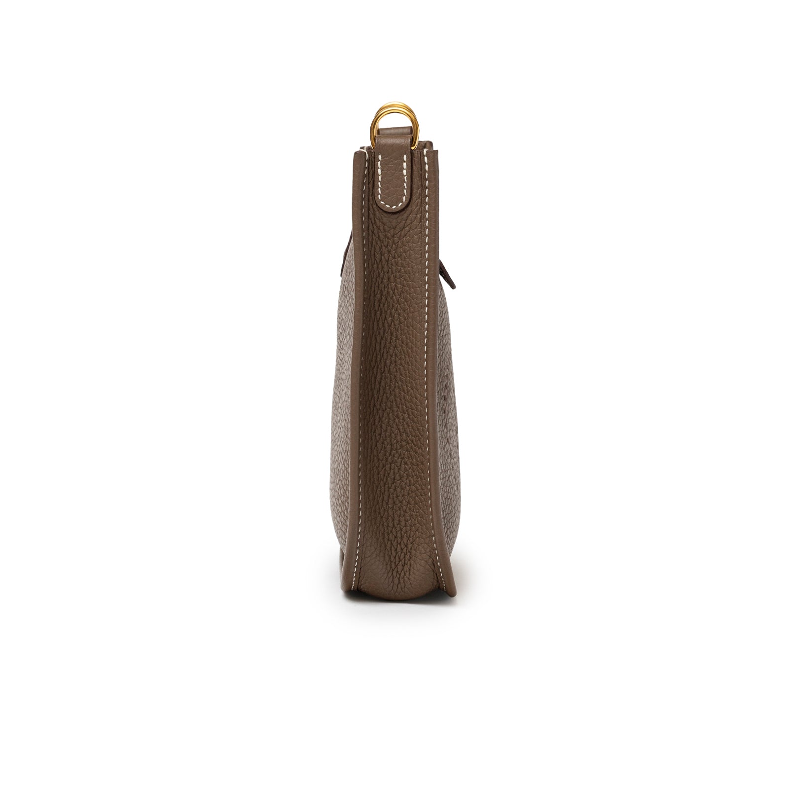 Side view of Hermès Mini Evelyne Etoupe Blue Indigo Clemence Gold Hardware showing gold ring and smooth edge stitching detail