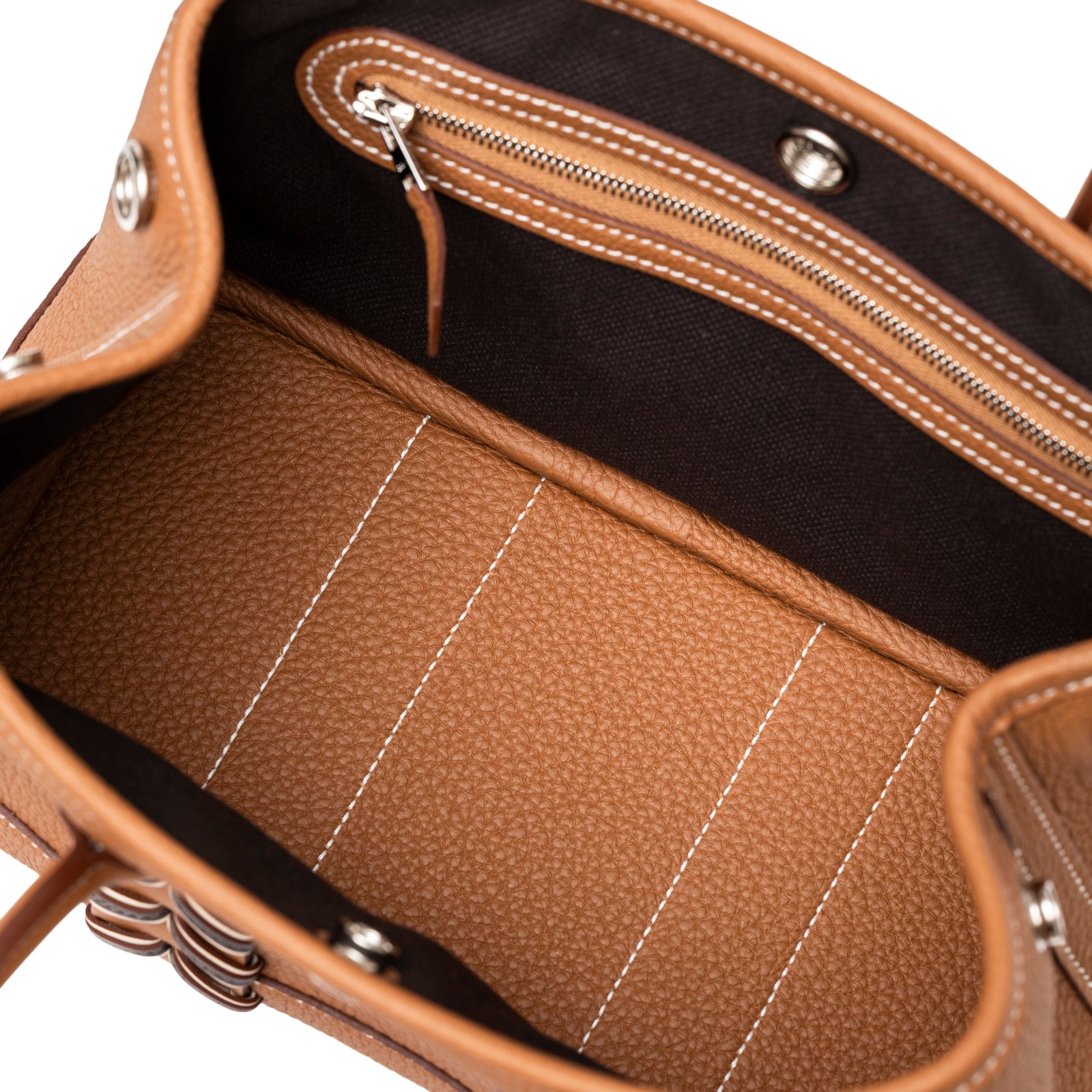 Interior view of Hermès Mini Garden Party Neo 23 Bredies Gold Bai Brun Craie Togo Palladium Hardware showing zip pocket and lining details