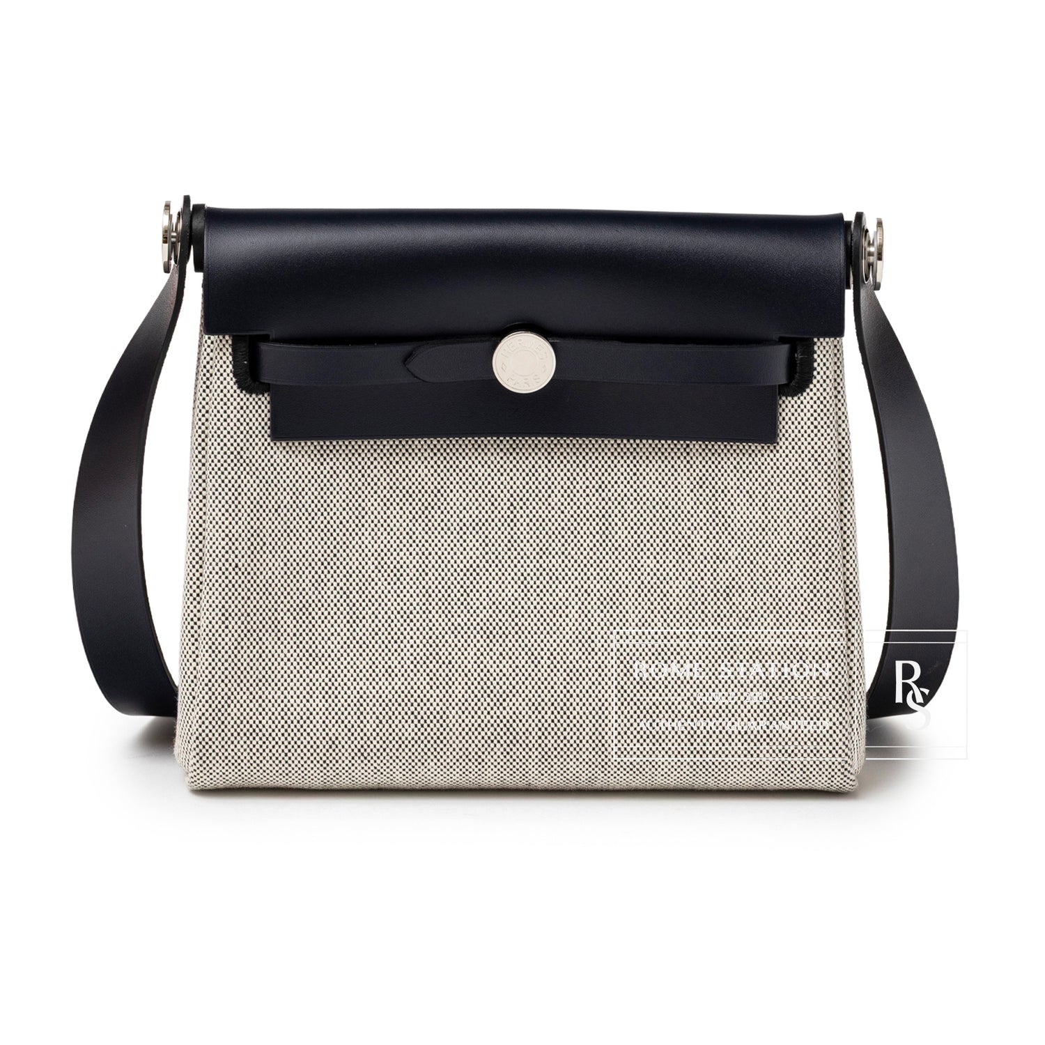 Front view of Hermès Mini Herbag Zip 20 Ecru-Black Blue Indigo Toile and Vache Hunter Palladium Hardware handbag