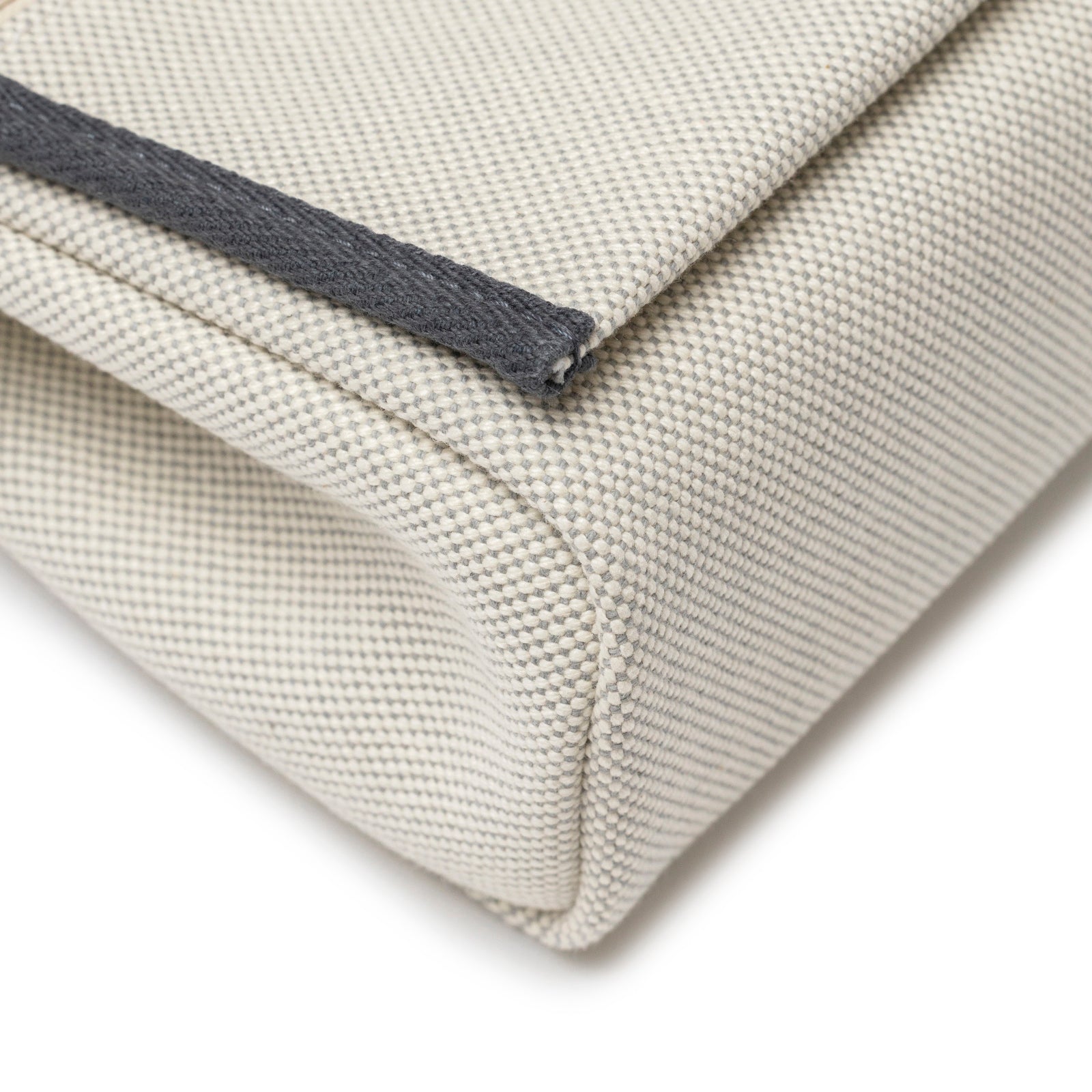 Close-up corner view of Hermès Mini Herbag Zip 20 Ecru-Blue Glacier/Ardoise Toile and Vache Hunter Palladium Hardware